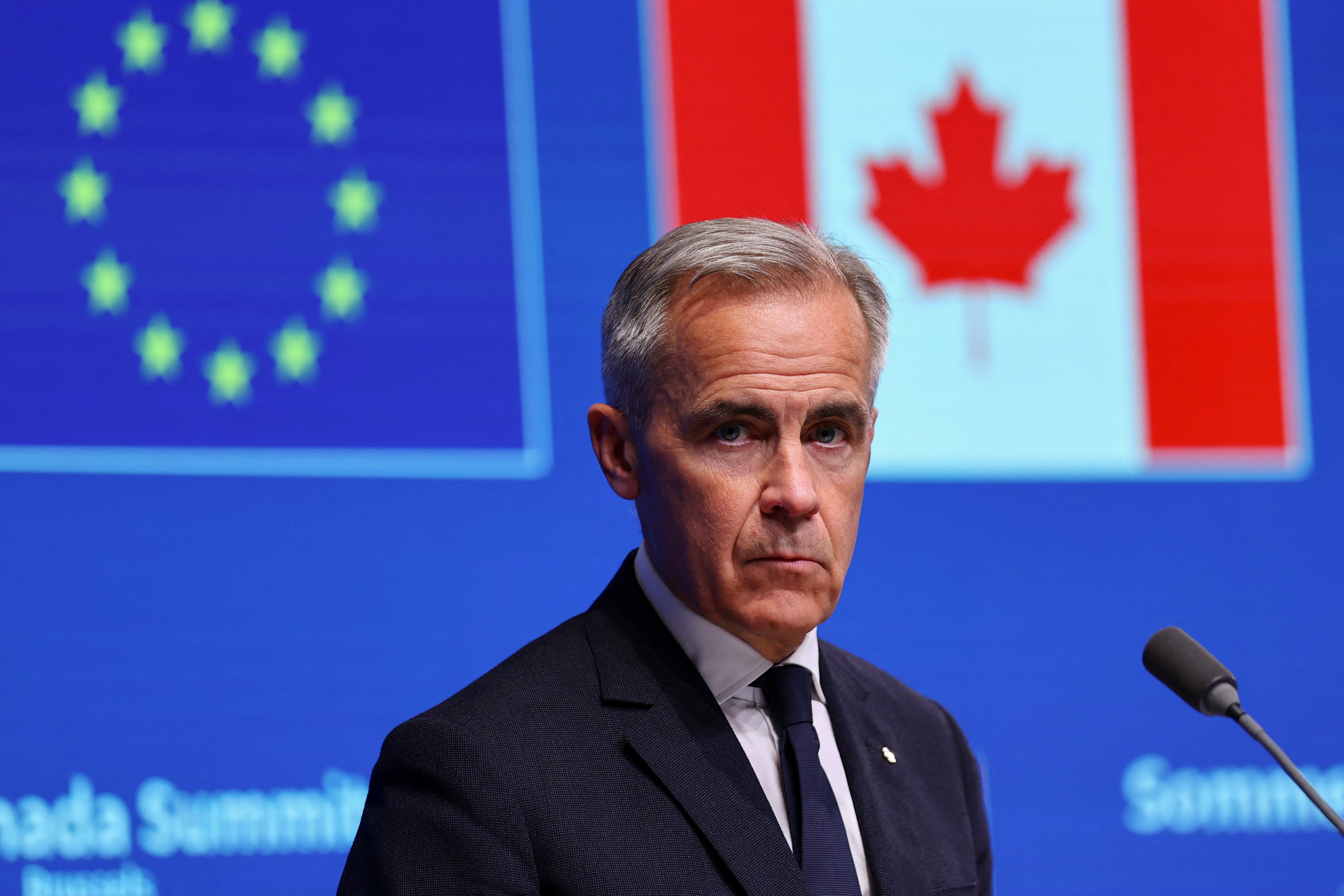 Canadian Prime Minister Mark Carney looks on during a joint news conference with European Commission President Ursula von der Leyen and European Council President Antonio Costa, during an EU-Canada summit in Brussels, Belgium June 23, 2025. REUTERS/Gonzalo Fuentes
