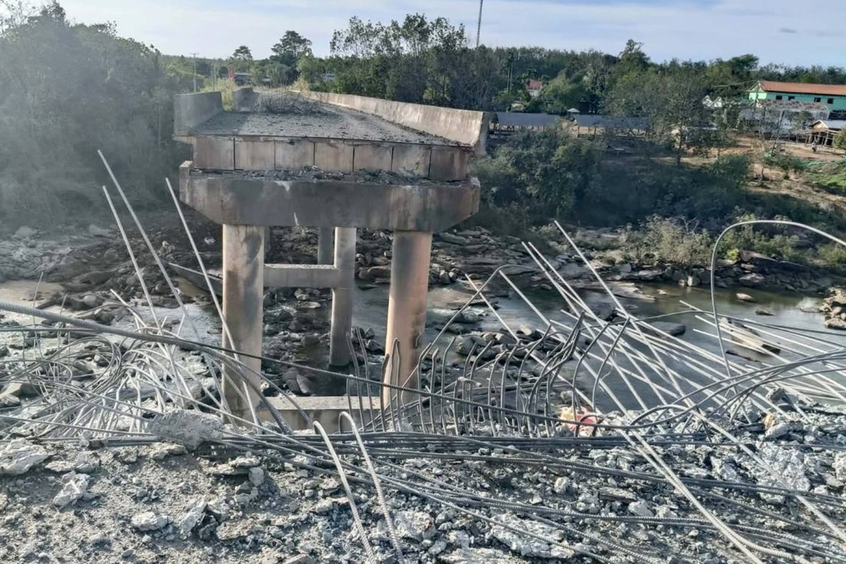 This handout photo taken and released by Agence Kampuchea Press (AKP) on December 13, 2025 shows a damaged bridge after Thai military strikes in Pursat province, amid clashes along the Cambodia-Thailand border. Violence between the Southeast Asian neighbours, which stems from a long-running dispute over the colonial-era demarcation of their 800-kilometre (500-mile) border, has displaced around half a million people on both sides.