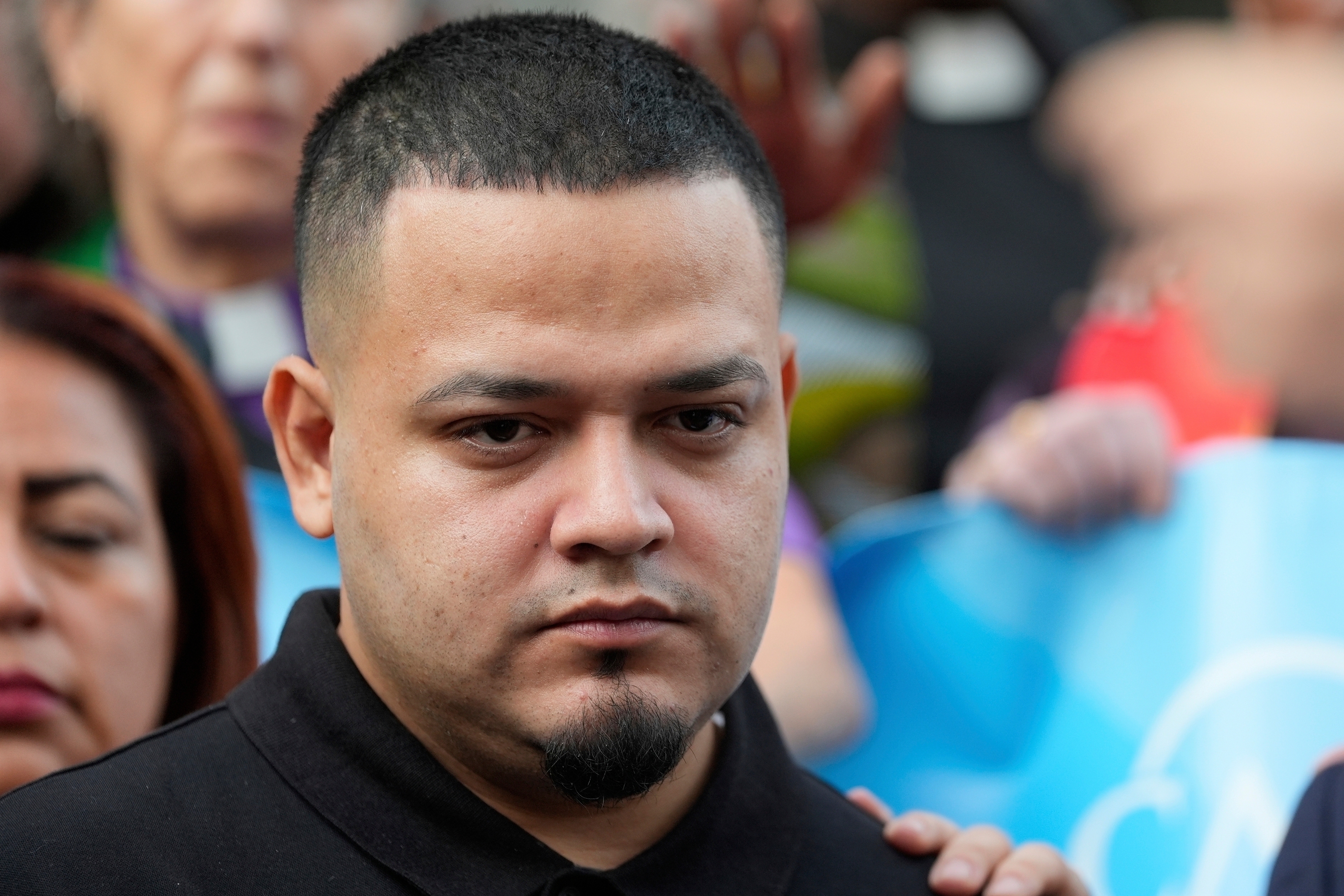 FILE - Kilmar Abrego Garcia joins supporters in a protest rally outside the Immigration and Customs Enforcement field office in Baltimore, Aug. 25, 2025. (AP Photo/Stephanie Scarbrough, File)