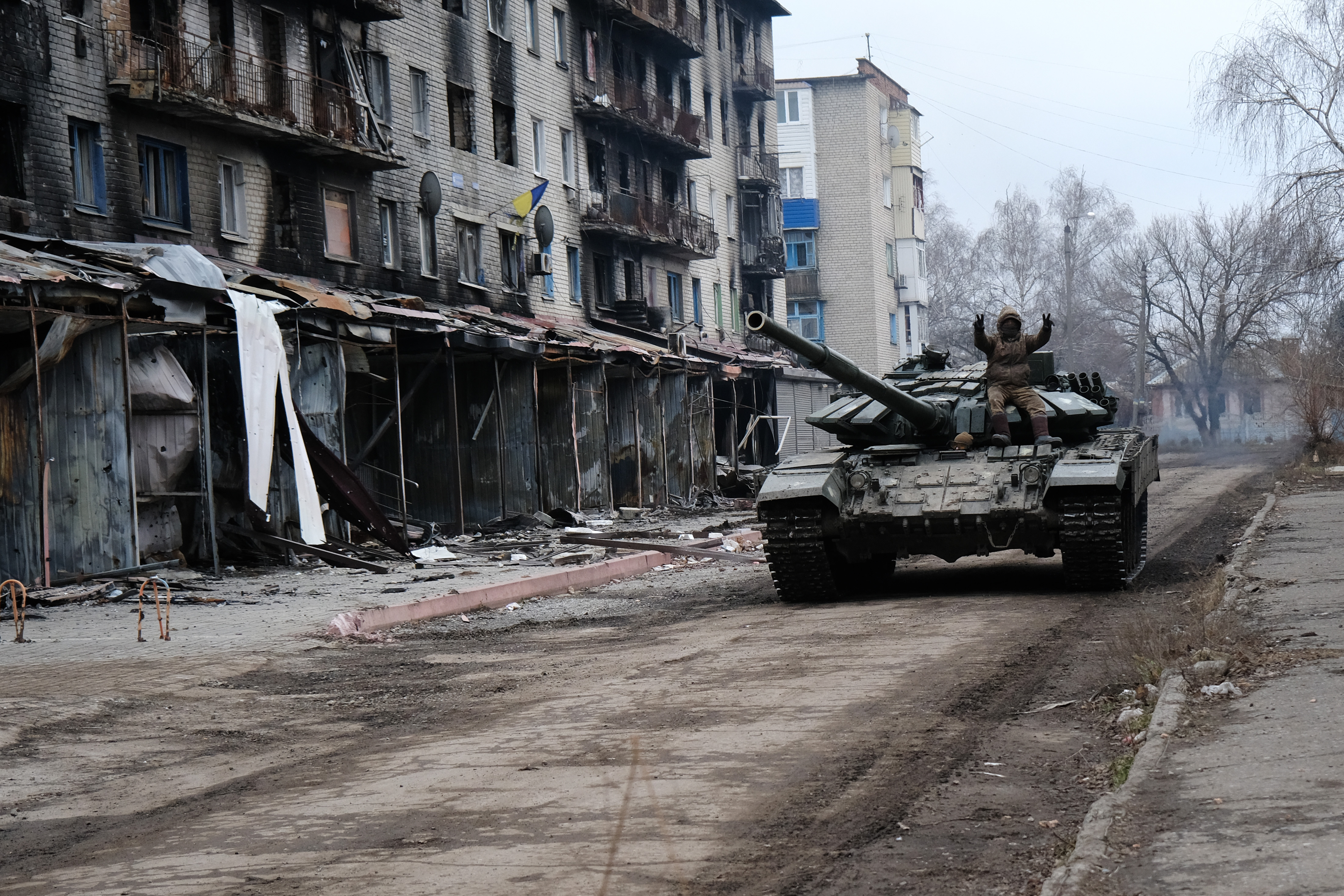 SIVERSK, UKRAINE - JANUARY 21: A Ukrainian tank drives down a street in the heavily damaged town of Siversk which is situated near the front lines with Russia on January 21, 2023 in Siversk, Ukraine. Russia has stepped up its offensive in the Donetsk region in the new year, with the region's Kyiv-appointed governor accusing Russia of using scorched-earth tactics. (Photo by Spencer Platt/Getty Images)