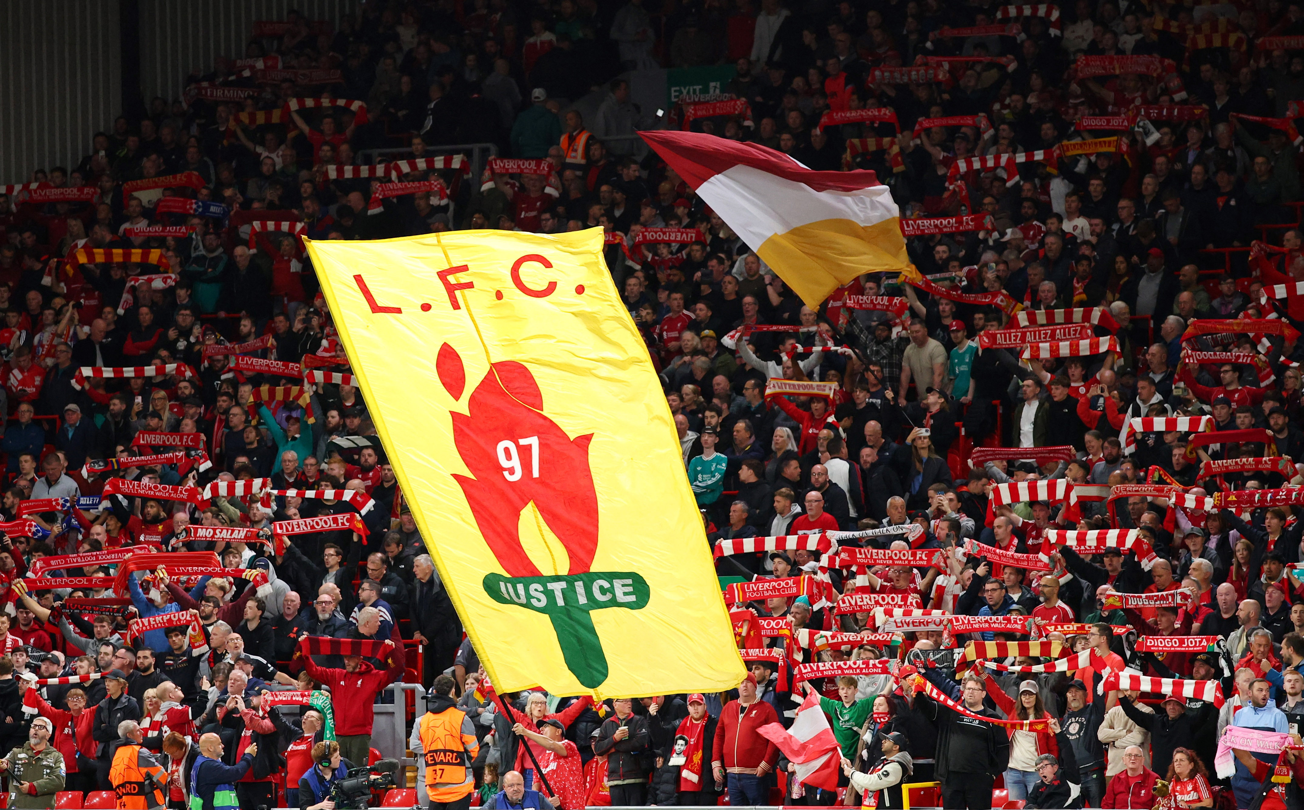 Soccer Football - UEFA Champions League - Liverpool v Atletico Madrid - Anfield, Liverpool, Britain - September 17, 2025 Liverpool fans display a banner in memory of the 97 victims of the Hillsborough disaster Action Images via Reuters/Andrew Boyers