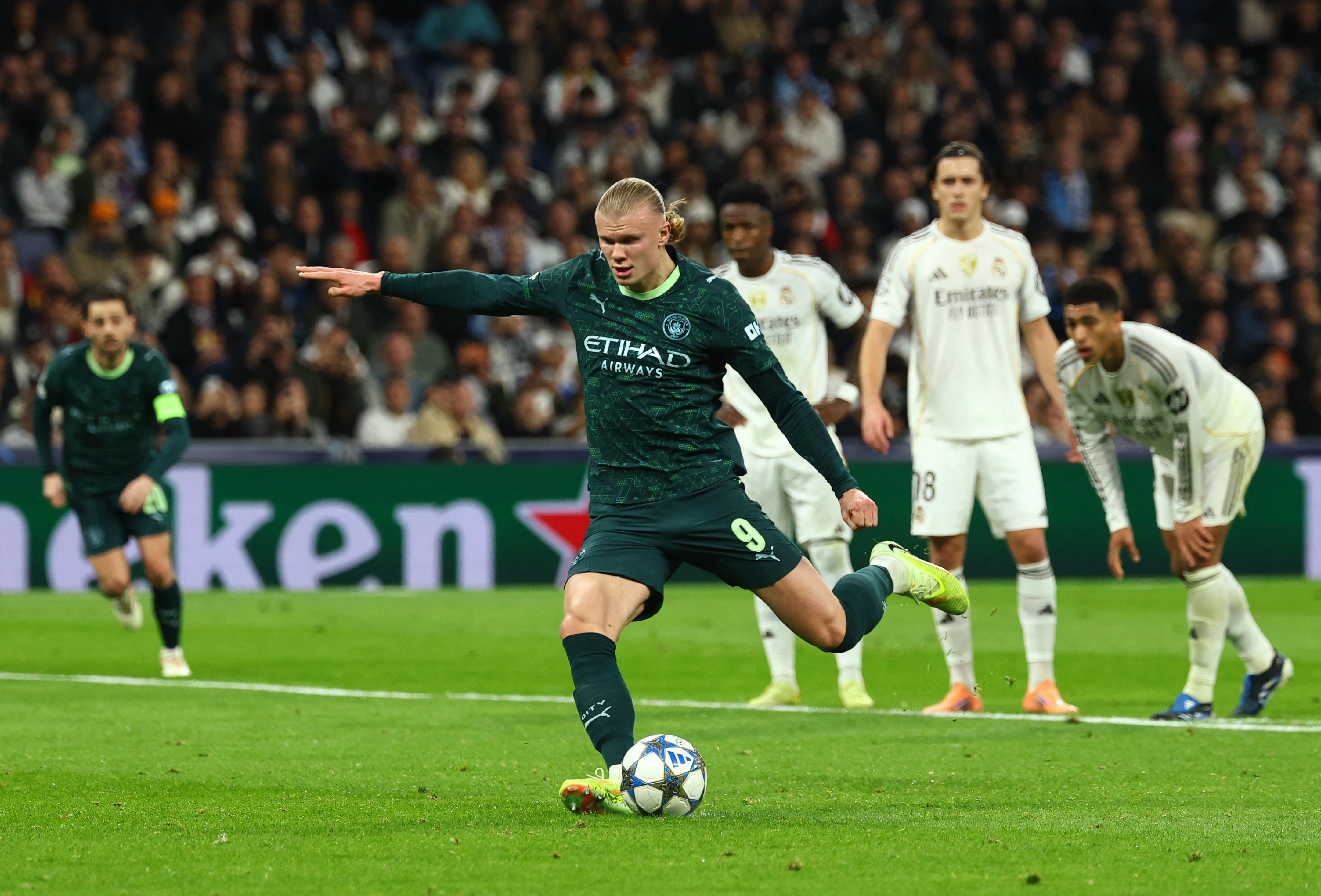 Soccer Football - UEFA Champions League - Real Madrid v Manchester City - Santiago Bernabeu, Madrid, Spain - December 10, 2025 Manchester City's Erling Haaland scores their second goal from the penalty spot REUTERS/Susana Vera