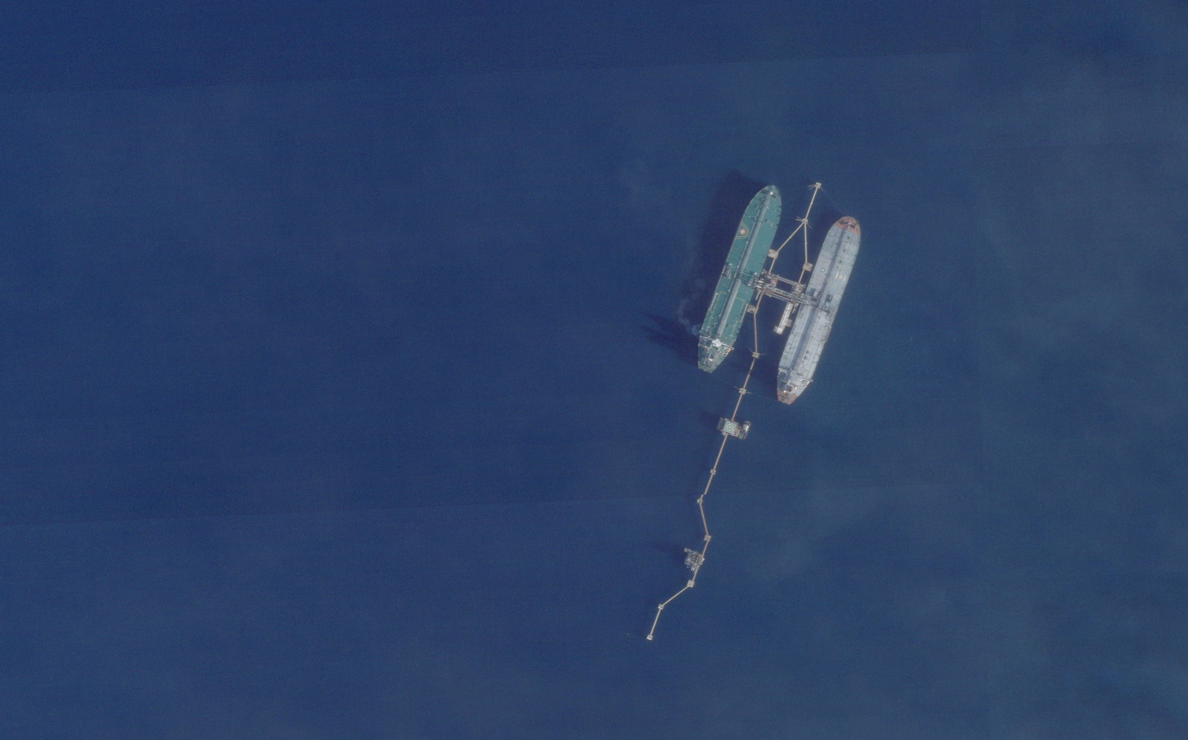 A satellite image shows the very large crude carrier (VLCC) Skipper, which British maritime risk management group Vanguard said was believed to have been seized on December 10, as well as another vessel, off Port Jose, Venezuela, November 18, 2025. 2025 PLANET LABS PBC/Handout via REUTERS THIS IMAGE HAS BEEN SUPPLIED BY A THIRD PARTY. MANDATORY CREDIT VERIFICATION: The ship on the right was verified as Skipper from apparatus, painted lines and pipework on the deck along with the configuration of the bridge which matched U.S. Attorney General footage showing tanker being seized. Those visual indicators also matched file imagery of the ship. Commodity analyst Kpler also used satellite imagery and Automatic Identification System (AIS) data to locate it off Port Jose in November, 2025. TPX IMAGES OF THE DAY