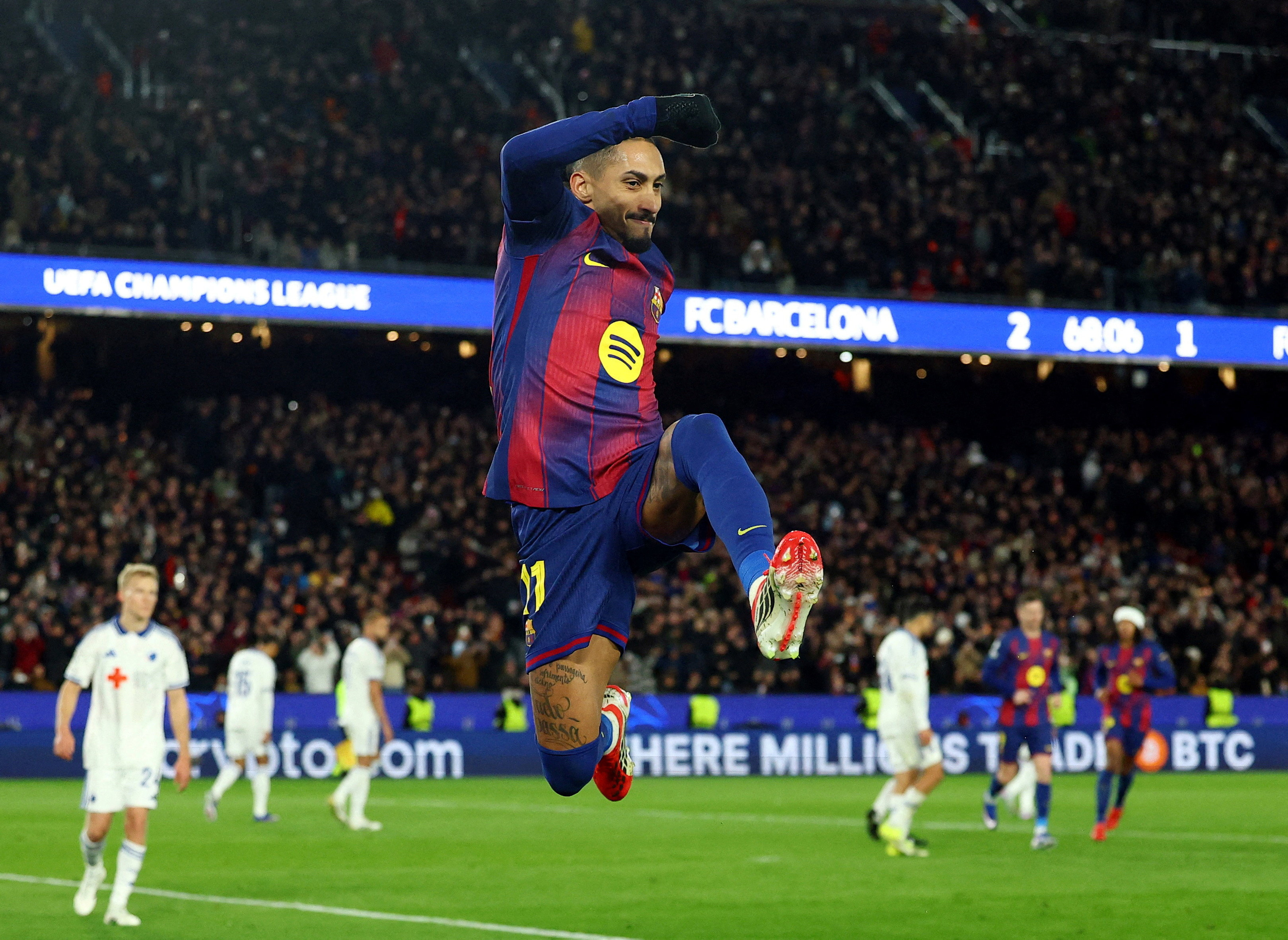 Barcelona's Raphinha celebrates scoring their third goal