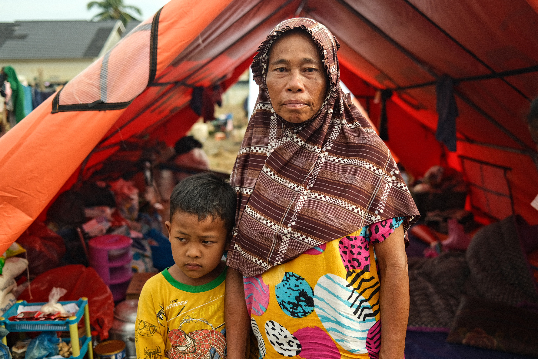 Massiani is living in a tent with her extended family. There are more than 14 of them sharing one tent. She said she is thankful to have received a tent, after sheltering under a scrap plastic for days. But she said there is still no toilet nearby, and the conditions are not sanitary.
