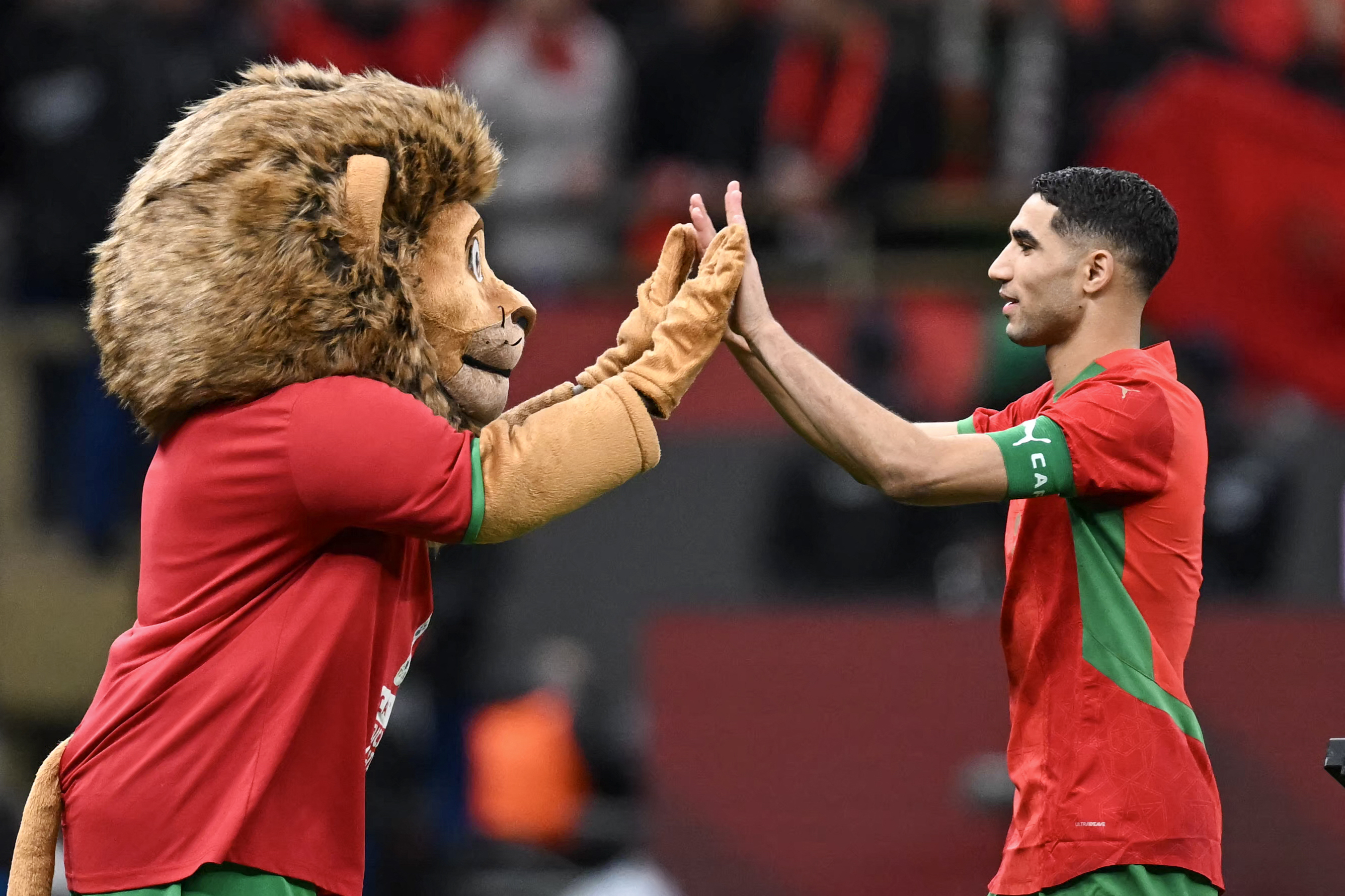 Morocco's defender #02 Achraf Hakimi celebrates after the Africa Cup of Nations (CAN) semi-final football match between Nigeria and Morocco at the Prince Moulay Abdellah stadium in Rabat