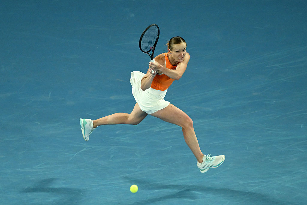 Elina Svitolina of Ukraine plays a backhand against Coco Gauff of the United States during the Women's Singles Quarterfinal match on day 10 of the 2026 Australian Open 