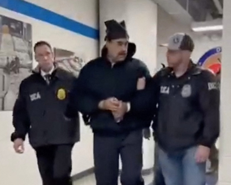 This screengrab of the X account of Rapid Response 47 shows Venezuelan President Nicolas Maduro escorted by US DEA agents in New York