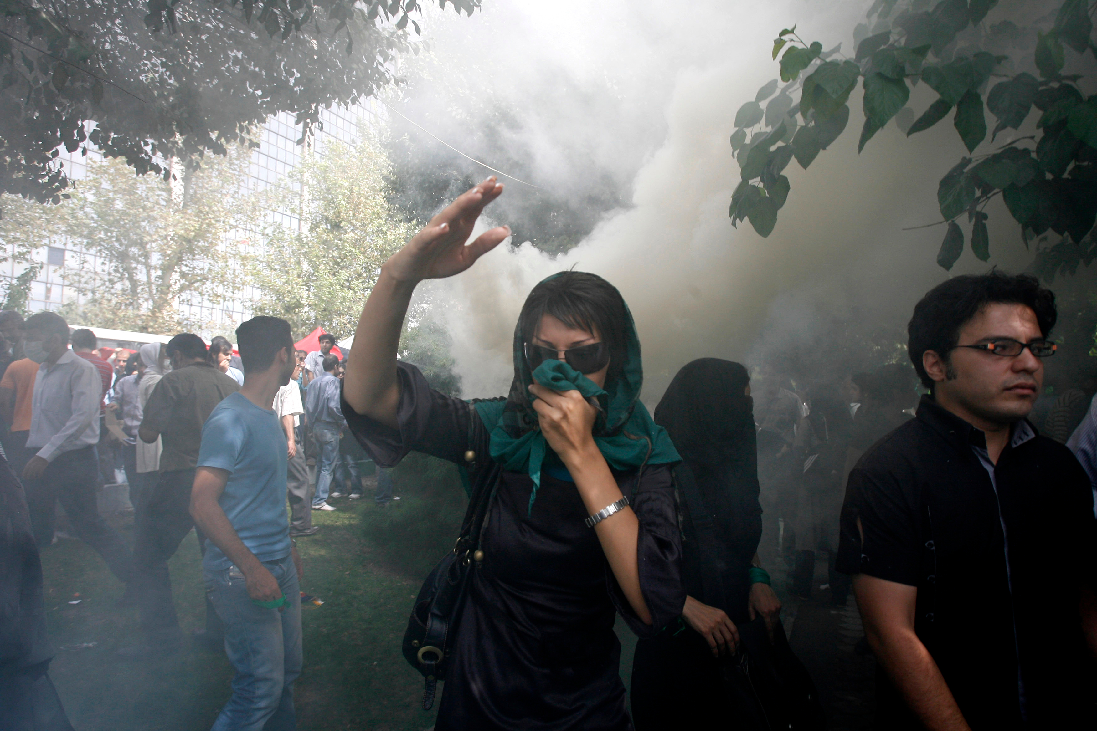 FILE - An Iranian female opposition supporter reacts as she attends a protest in Tehran, Iran, Friday, Sept. 18, 2009, in competition with government-sponsored mass rallies to mark an annual anti-Israel commemoration, the Quds Day that reflects the Persian nation's sympathy with the Palestinians. (AP Photo, File)