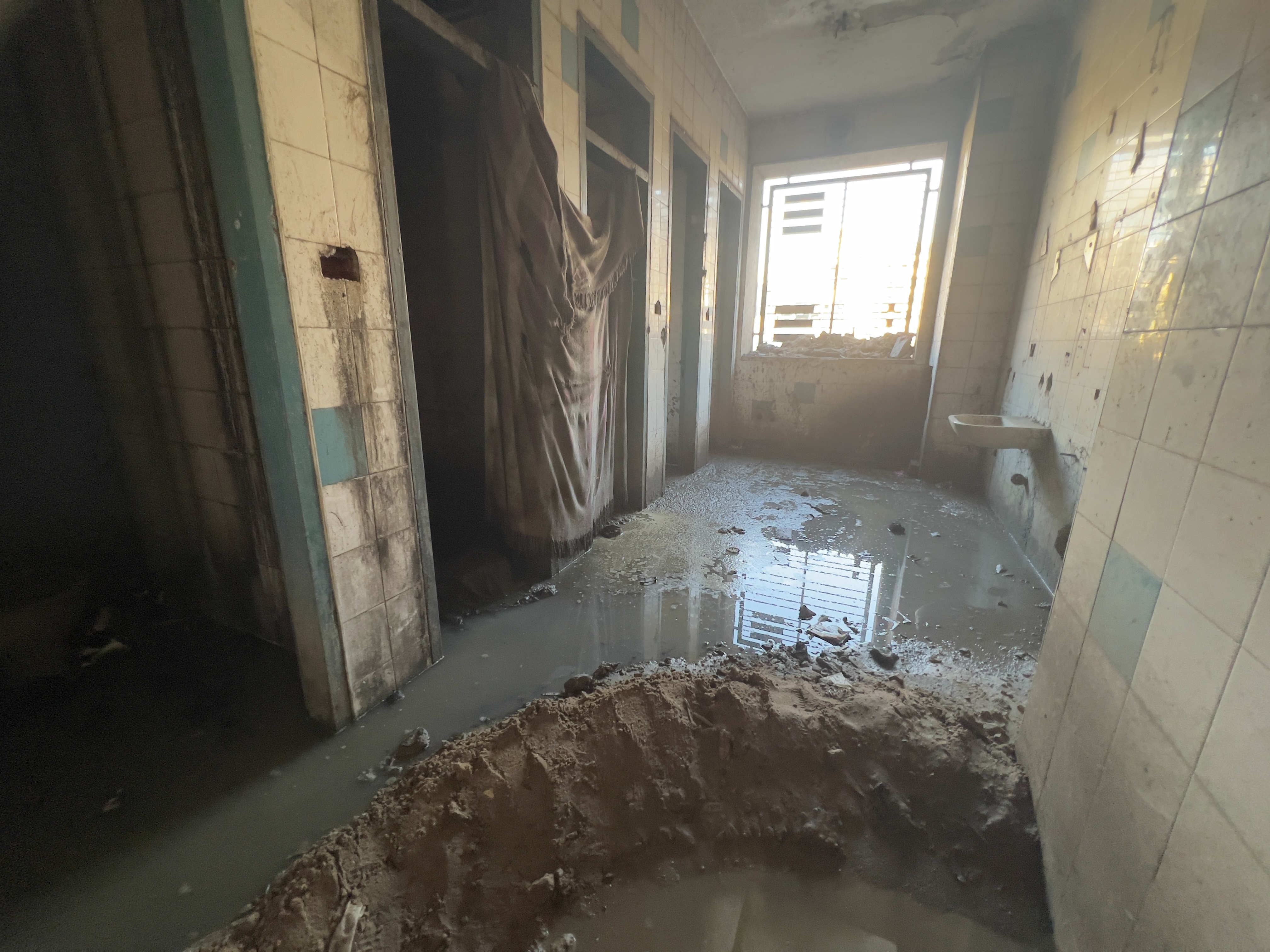 Wastewater flooding the public toilets in a shelter school in Gaza Cit