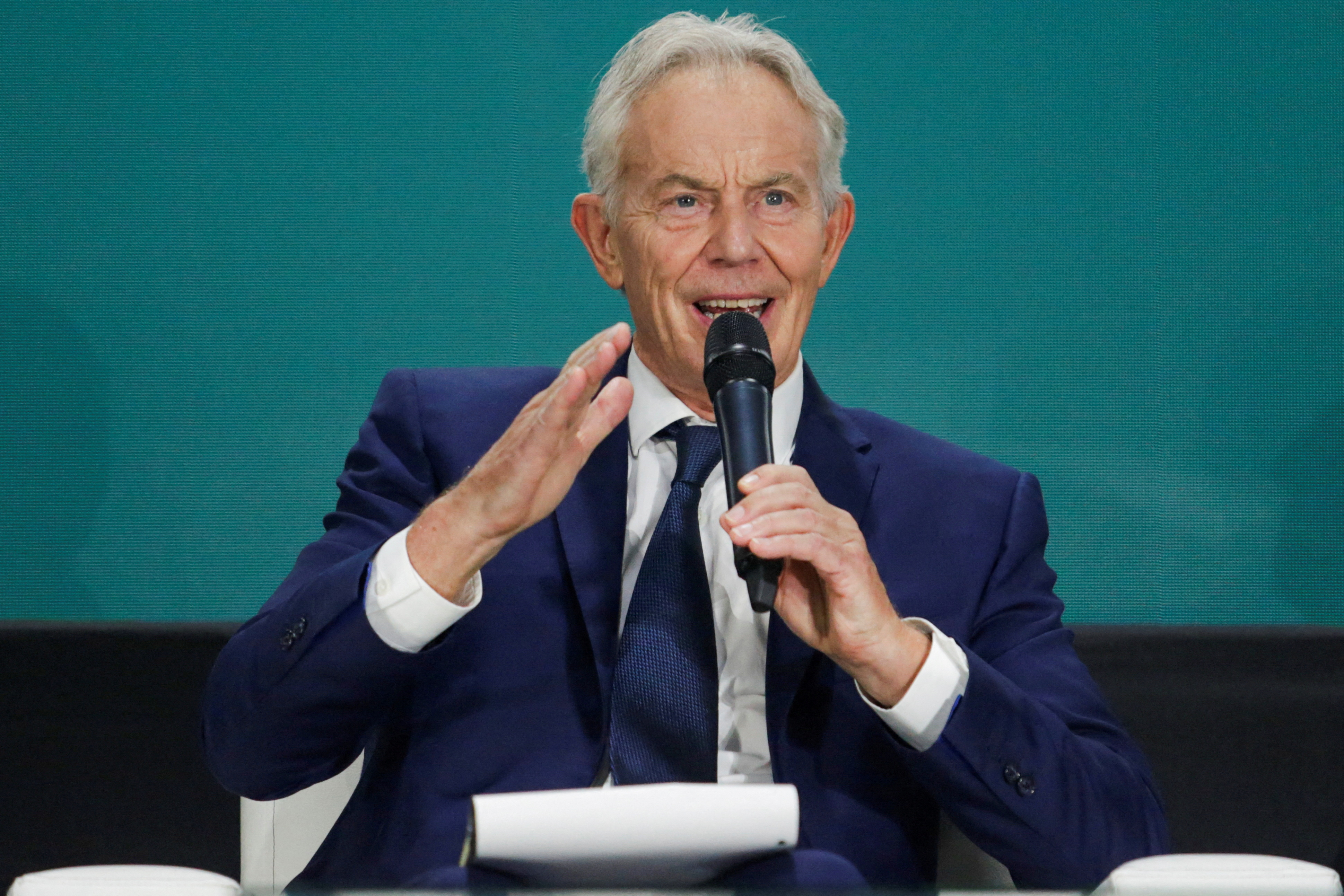 FILE PHOTO: Former British Prime Minister Tony Blair speaks during a dialogue at the International Bali Airshow at Ngurah Rai International Airport, in Kuta, Bali, Indonesia, September 18, 2024. REUTERS/Johannes P. Christo/File Photo