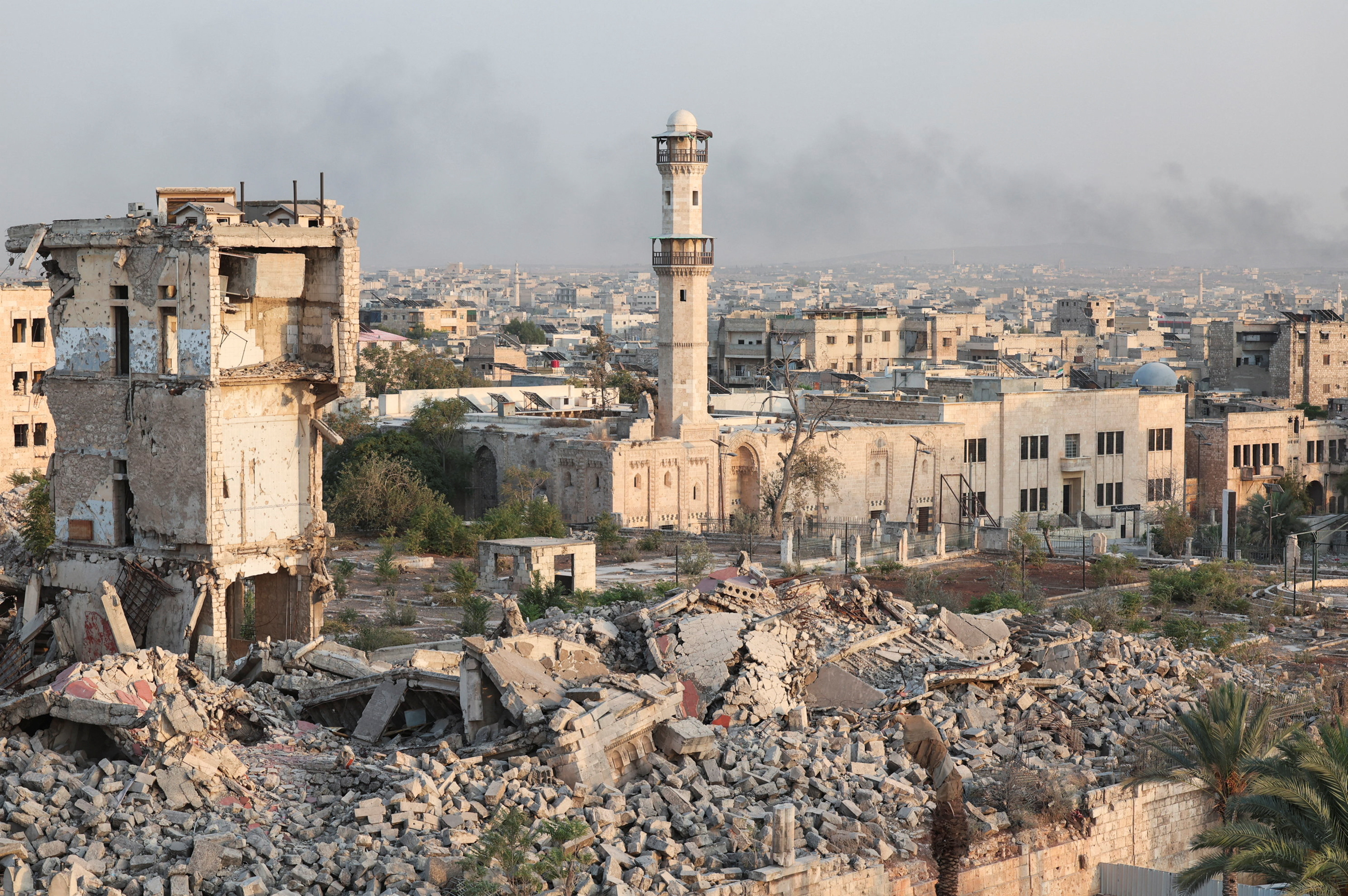 Rubble lies around Aleppo Citadel