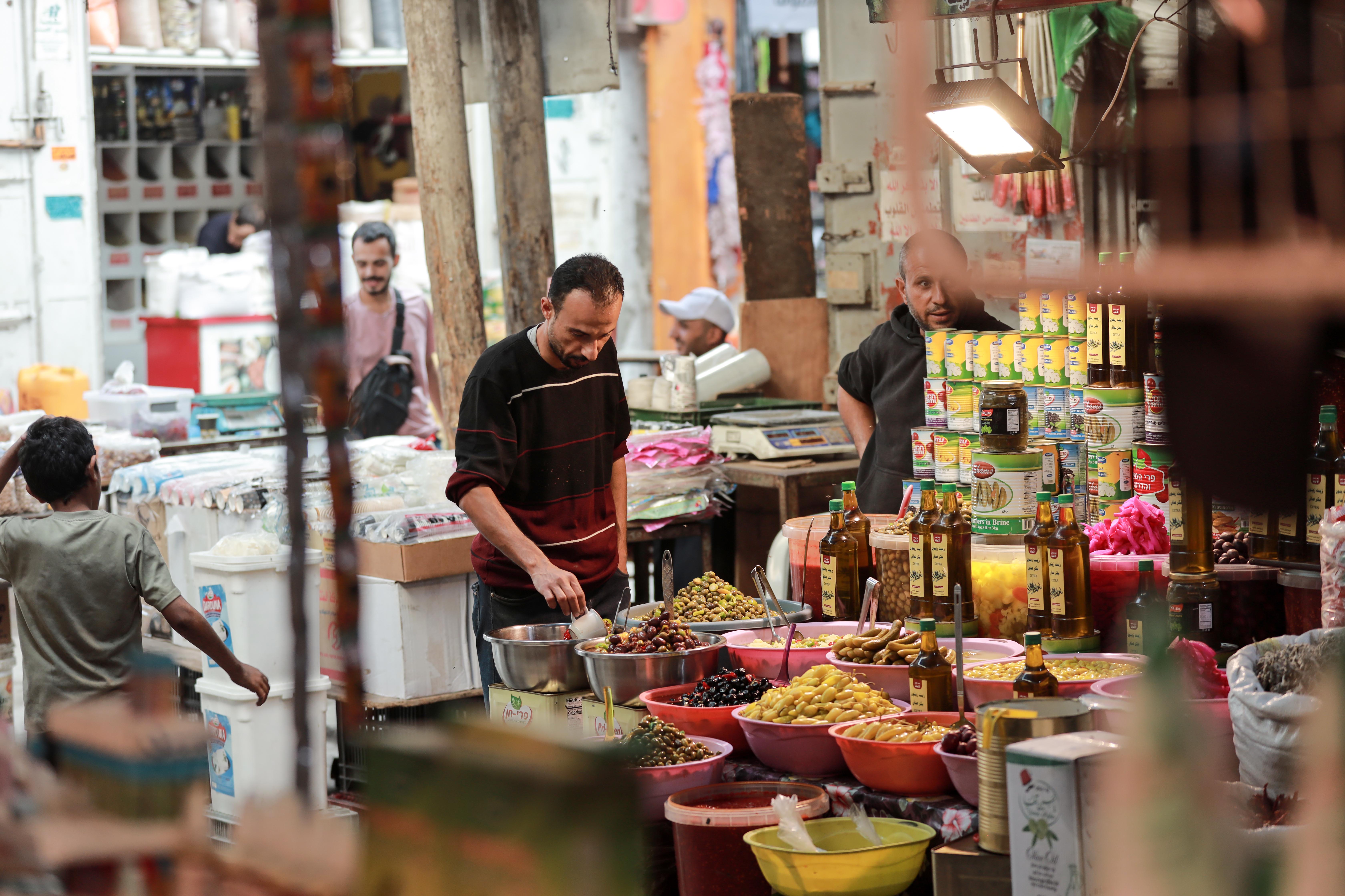 A man stands in a market