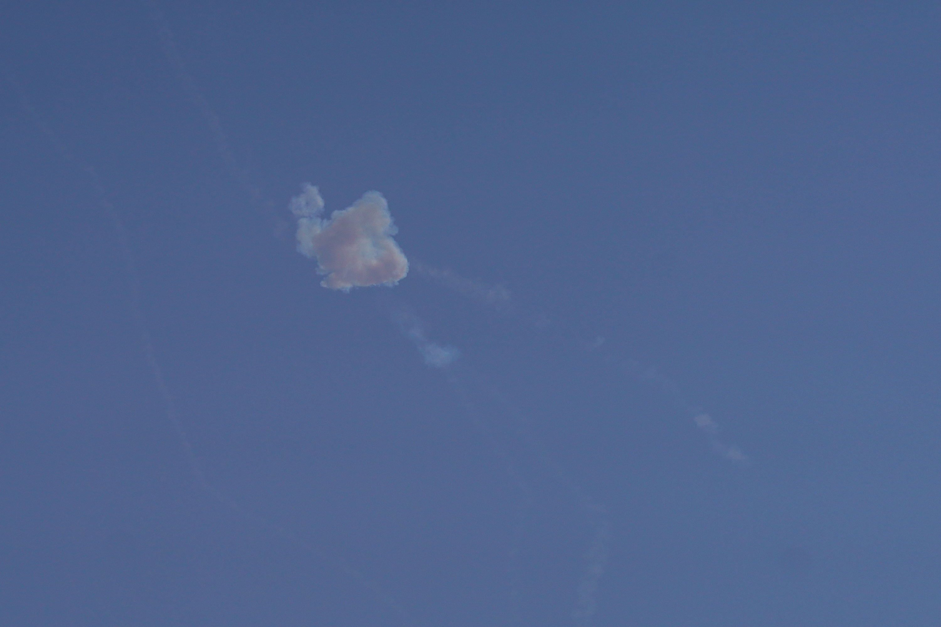 Smoke in Doha's sky as Qatar intercepts Iranian missiles.