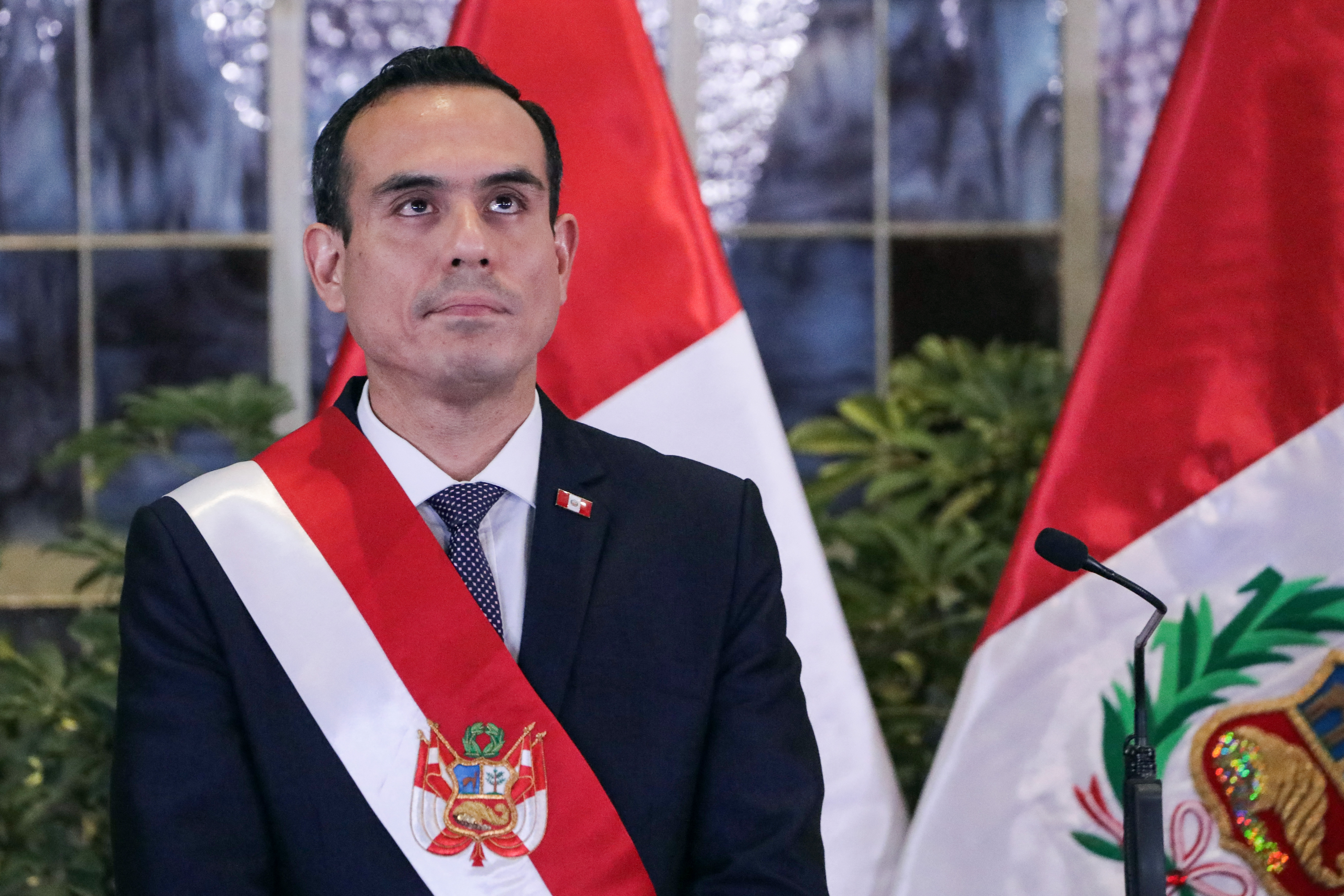 (FILES) Peru's interim President Jose Jeri looks on during the inauguration ceremony of his cabinet at the Presidential Palace in Lima on October 13, 2025.