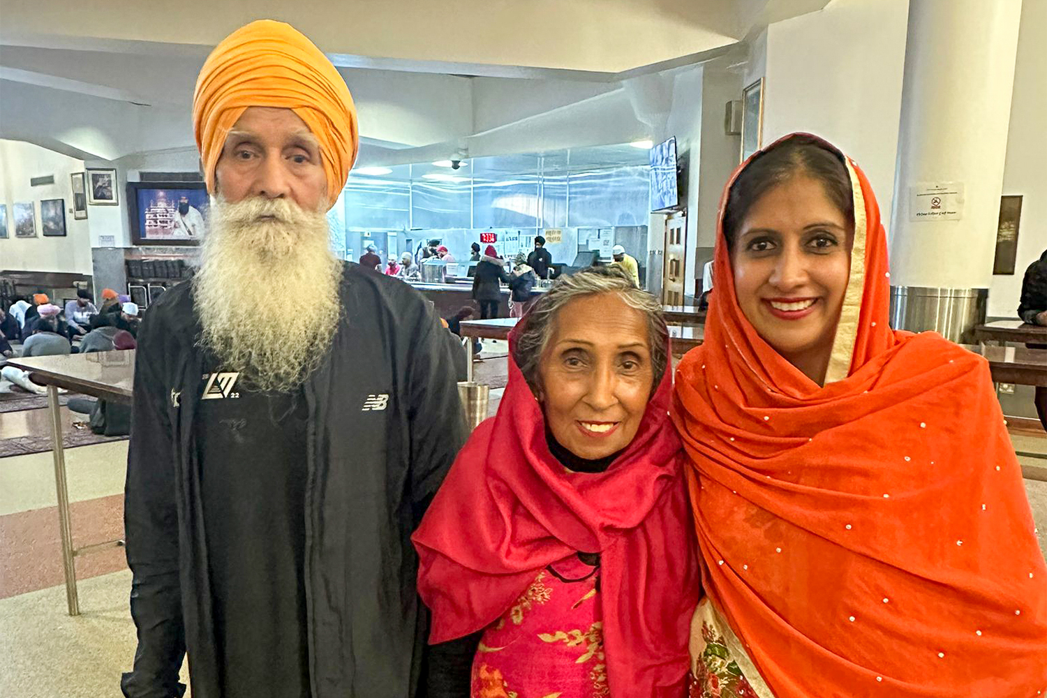carers [Minreet Kaur/Al Jazeera]