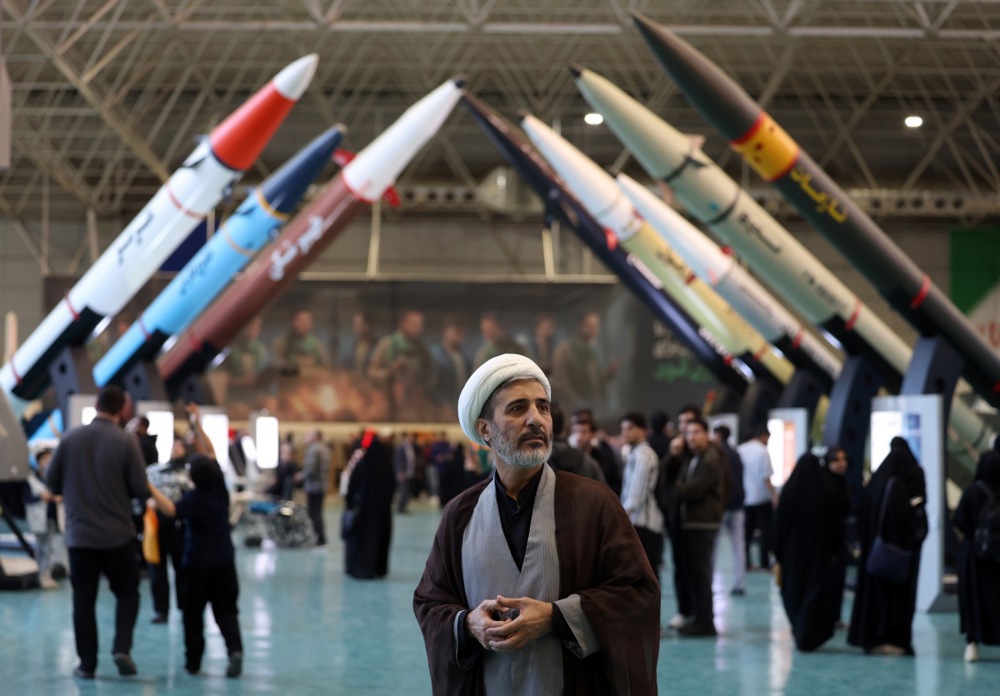 An Iranian cleric visits the Iranian Revolutionary Guard Corps (IRGC) Aerospace Achievements Exhibition