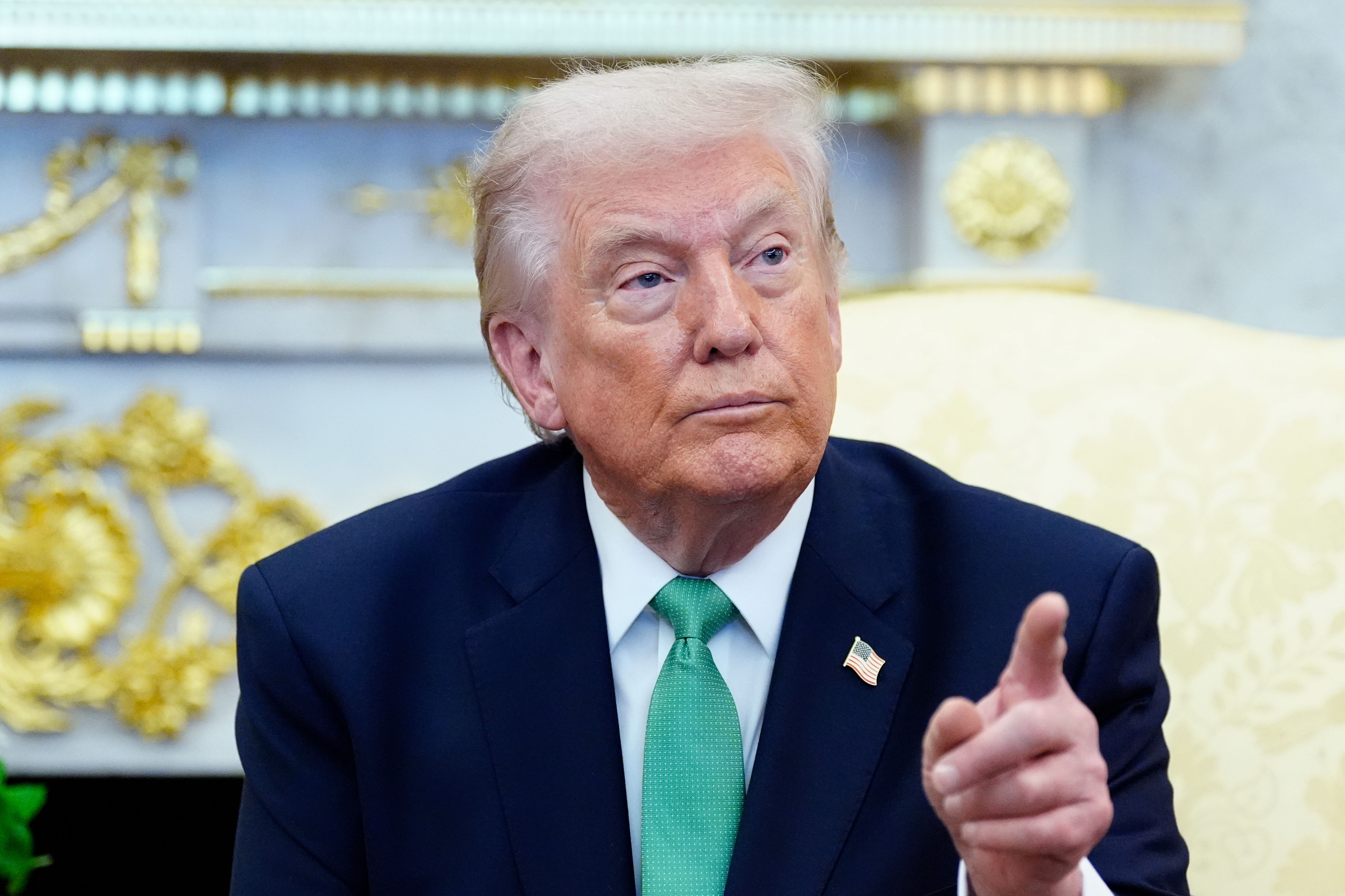 President Donald Trump takes questions from reporters during a meeting with Irish Prime Minister Micheál Martin in the Oval Office of the White House, on St. Patrick's Day, Tuesday, March 17, 2026, in Washington. [Alex Brandon/AP Photo]