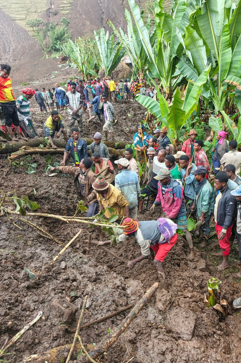 Locals search for the bodies of mudslide victims in the Gacho Baba district of the Gamo Zone in southern Ethiopia on Tuesday, March 10, 2026. (Gacho Baba District Government Communication Affairs Department via AP)