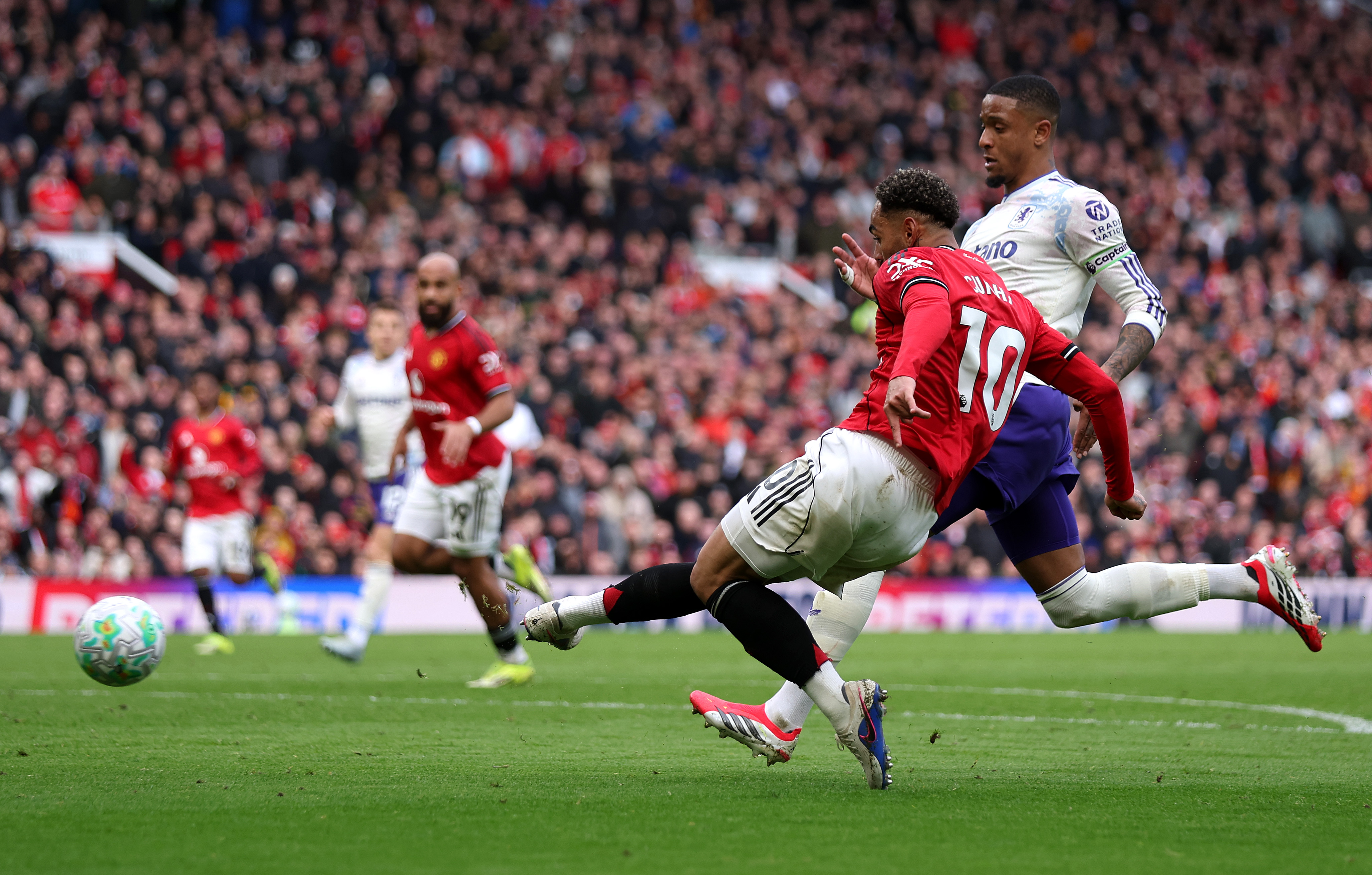 MANCHESTER, ENGLAND - MARCH 15: Matheus Cunha of Manchester United scores his team's second goal during the Premier League match between Manchester United and Aston Villa at Old Trafford on March 15, 2026 in Manchester, England. (Photo by Lewis Storey/Getty Images)