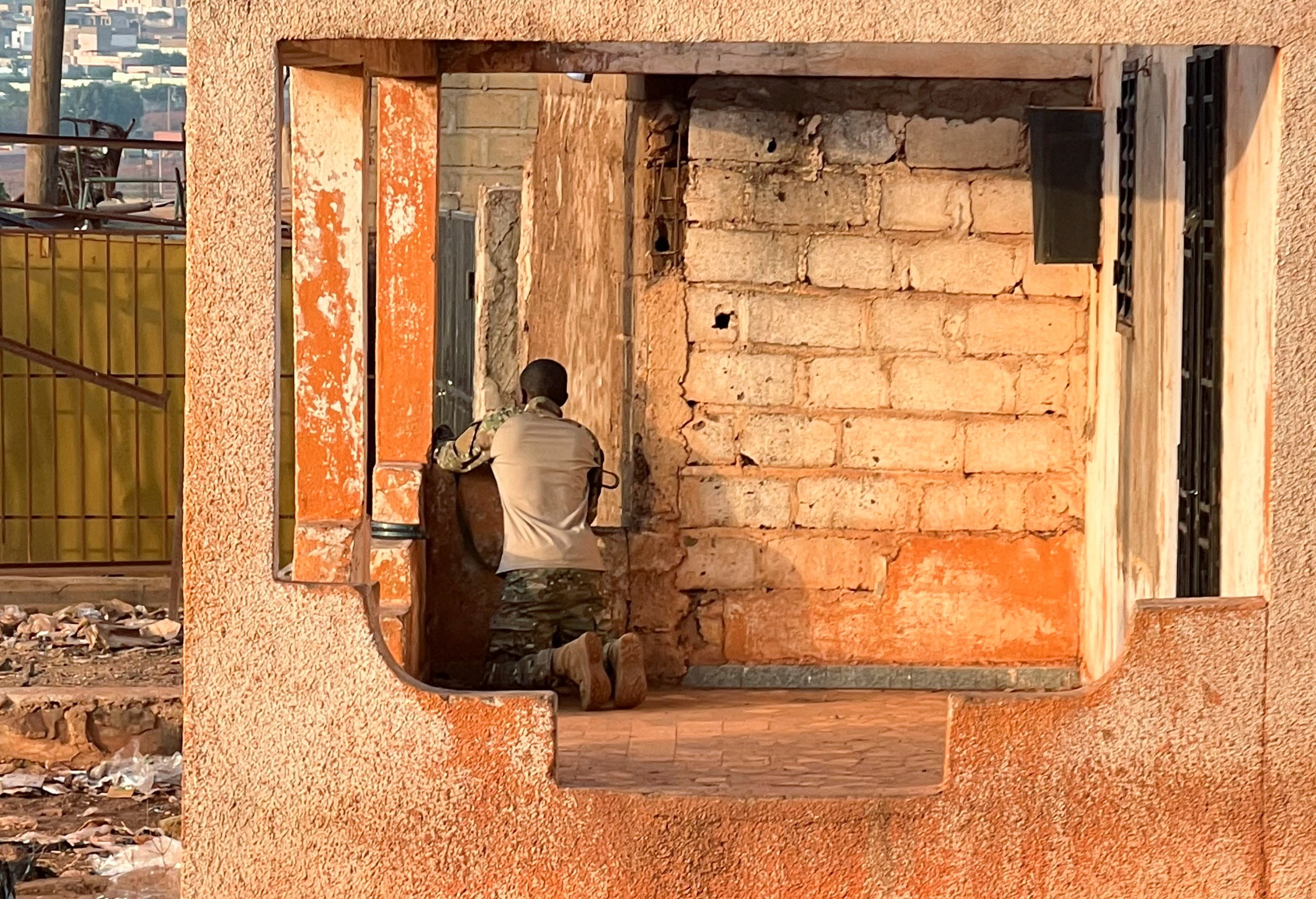 A Malian soldier stands in position with his weapon during an attack on Mali's main military base Kati outside the capital Bamako, Mali April 25, 2026. REUTERS/Stringer