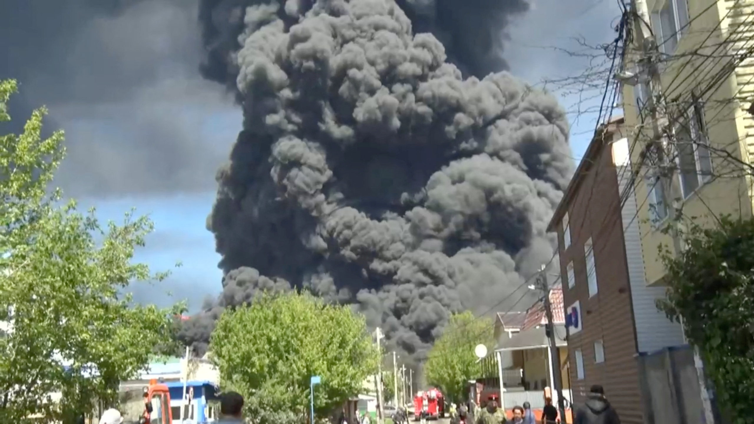 Heavy smoke rises above the area during a visit by Krasnodar region's Governor Veniamin Kondratyev, who inspects emergency services following a Ukrainian drone attack that caused a fire at an oil refinery, amid the Russia-Ukraine conflict, in Tuapse, Russia, April 28, 2026, in this still image taken from video. Governor of Krasnodar Region Veniamin Kondratyev/Handout via REUTERS ATTENTION EDITORS - THIS IMAGE WAS PROVIDED BY A THIRD PARTY. NO RESALES. NO ARCHIVES. MANDATORY CREDIT.