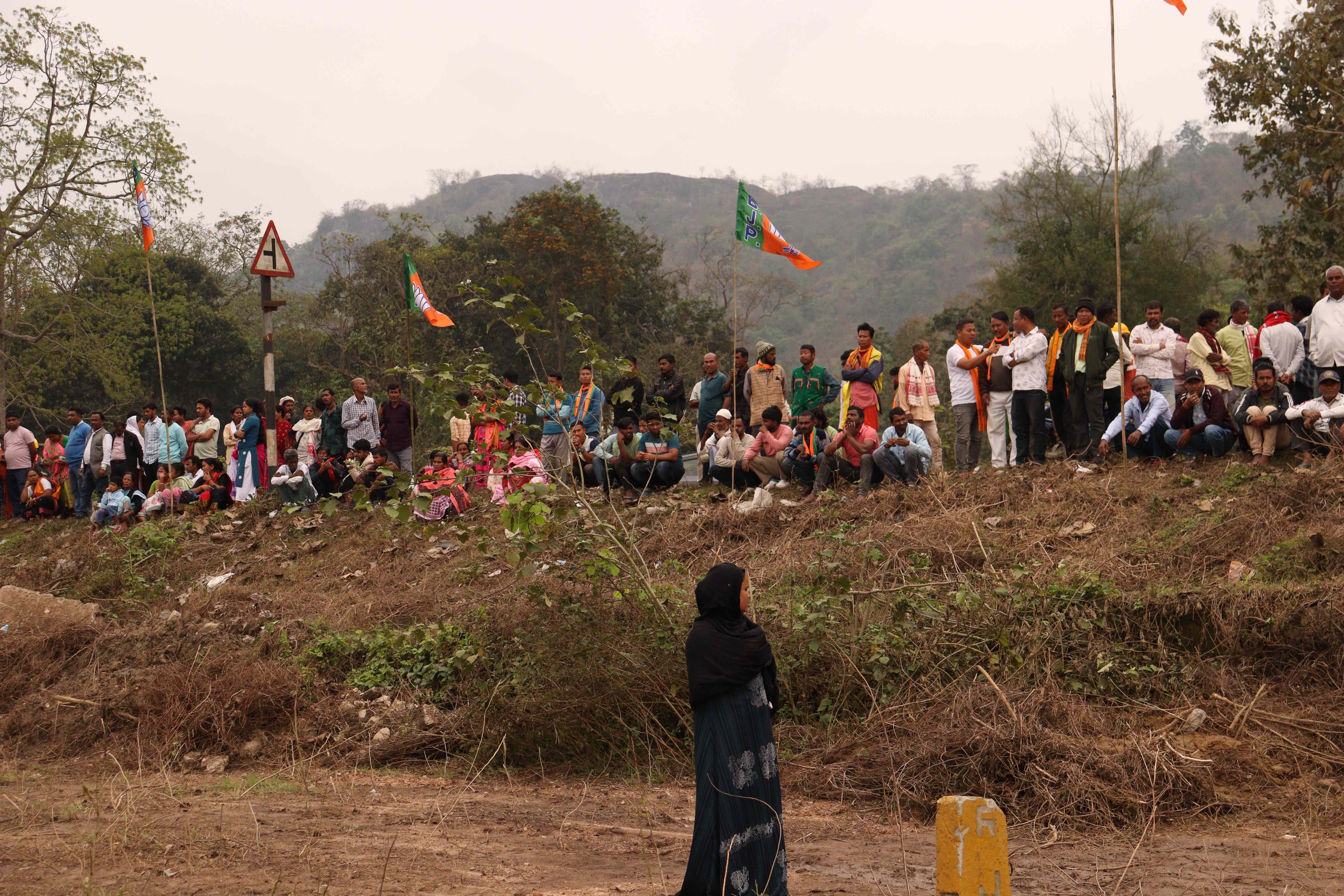 A muslim woman stands isolated in a BJP rally. Post delimiation, Muslim seats have gone down significantly-odd, signalling weaker representation (1). Arshad Ahmed_ Al jazeera_-1775032949
