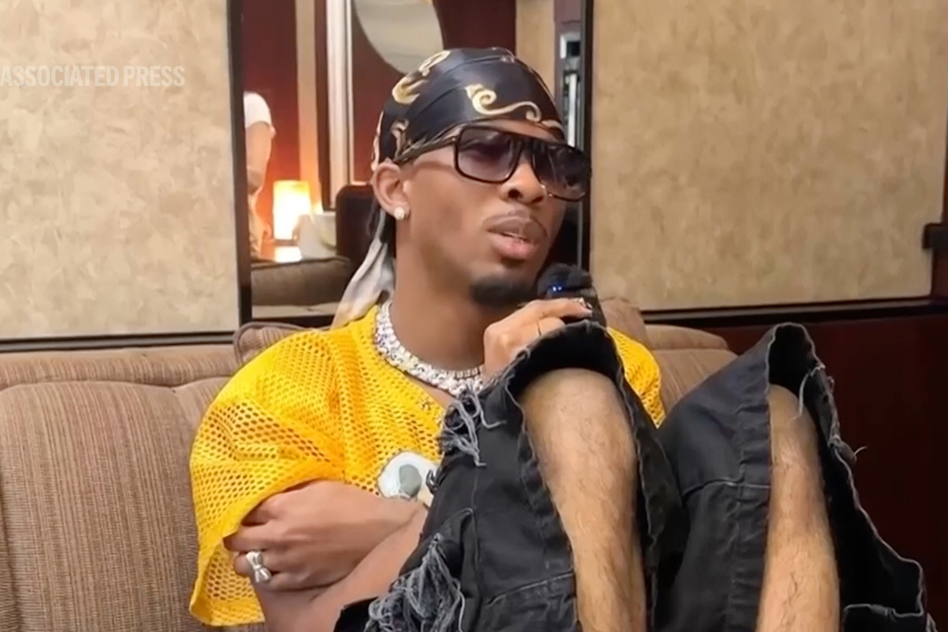 Singer-songwriter, David Burke aka D4vd sits in artist space at Coachella music festival on April 18, 2025 in Indio, Calif. [AP Photo]