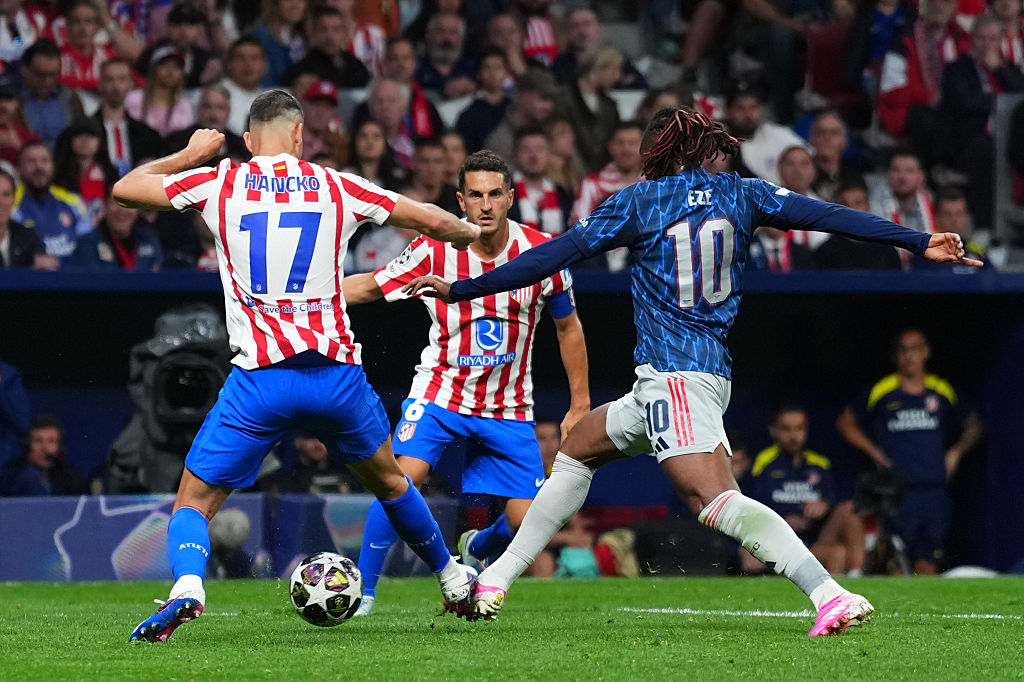 Eberechi Eze of Arsenal is fouled by David Hancko of Atletico de Madrid