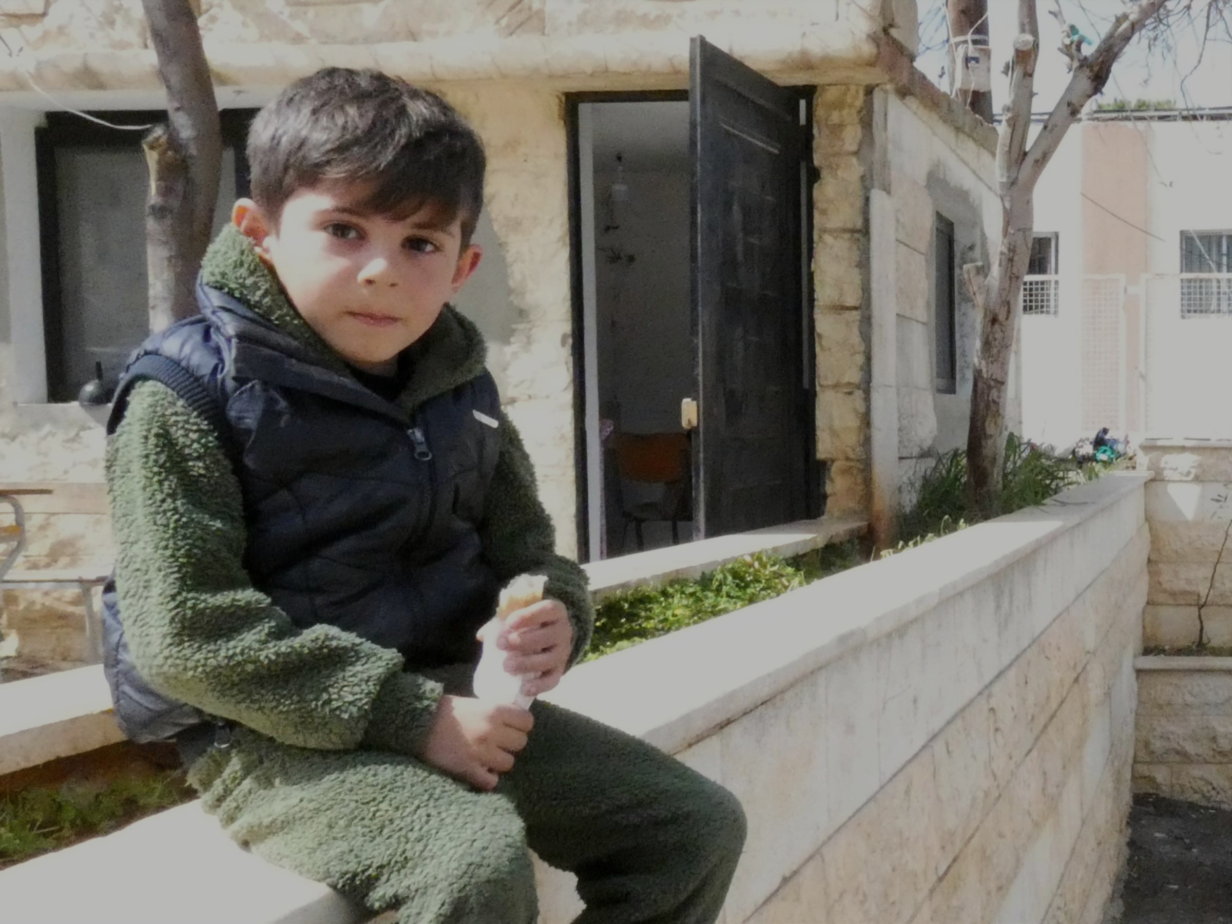Jad, 5-years old, who was displaced from his home.
