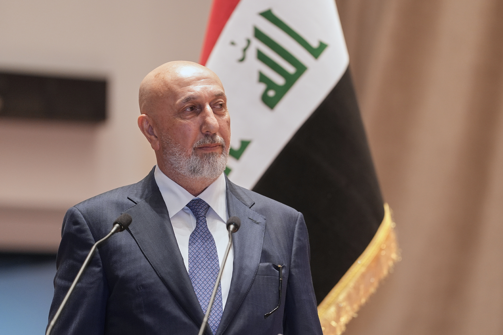 In this photo provided by the Iraqi Parliament Media Office, newly elected president of the Republic of Iraq, Nizar Amidi, speaks inside the Parliament after his election in Baghdad, Iraq, Saturday, April 11, 2026. (Iraqi Parliament Media Office via AP)