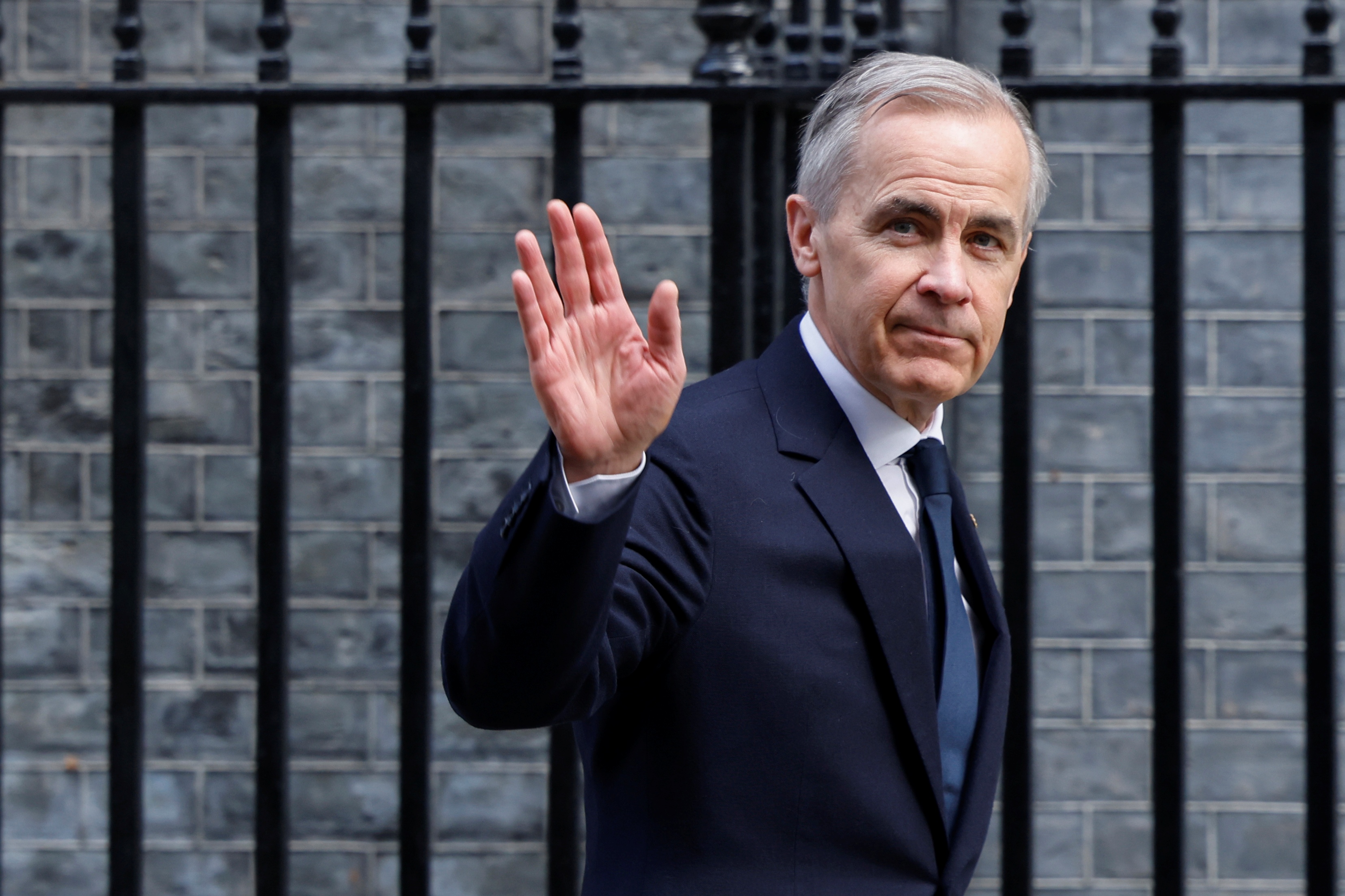 Prime Minister of Canada Mark Carney waves outside of 10 Downing Street in London, UK