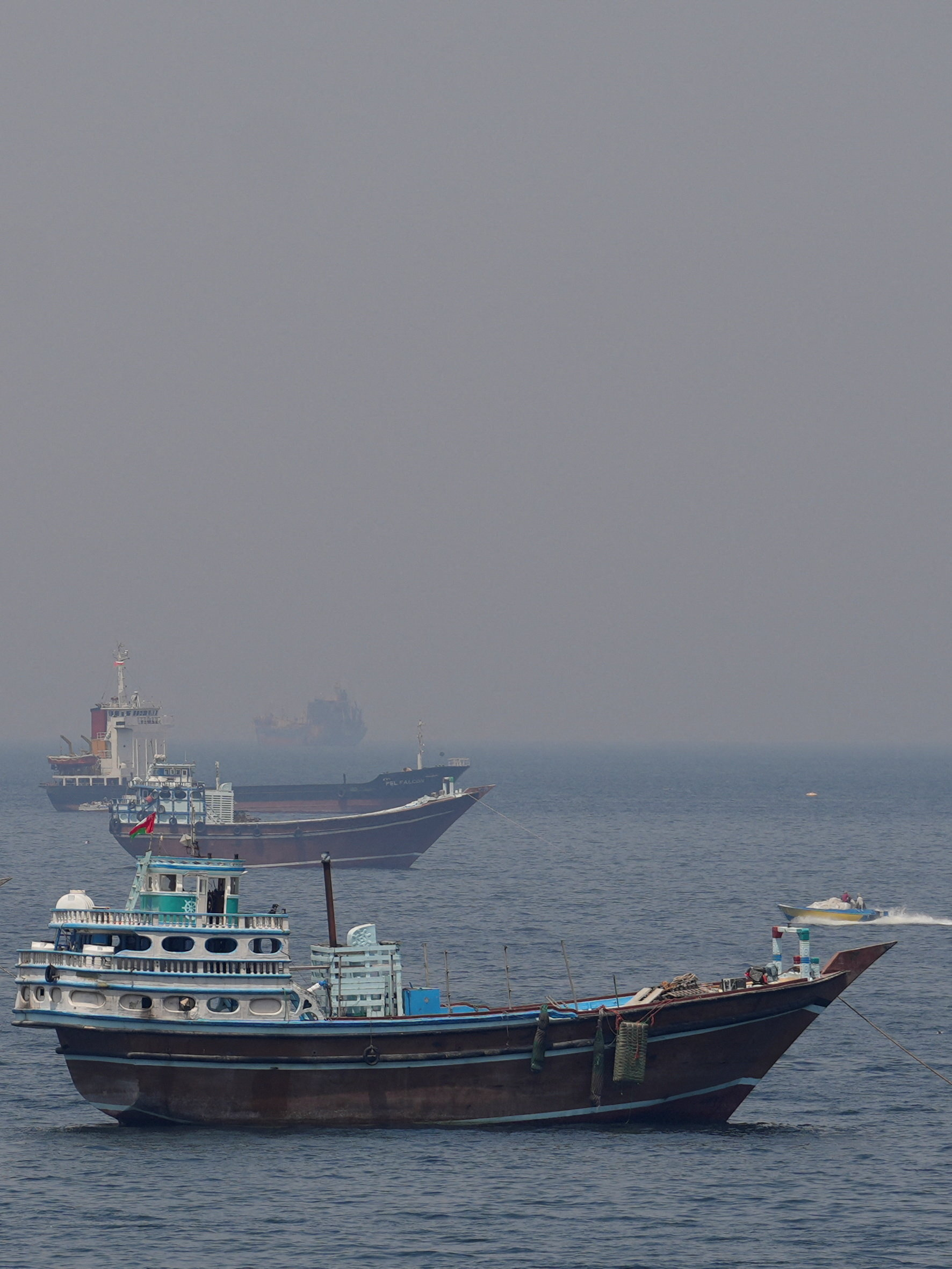 Ships and boats at sea.