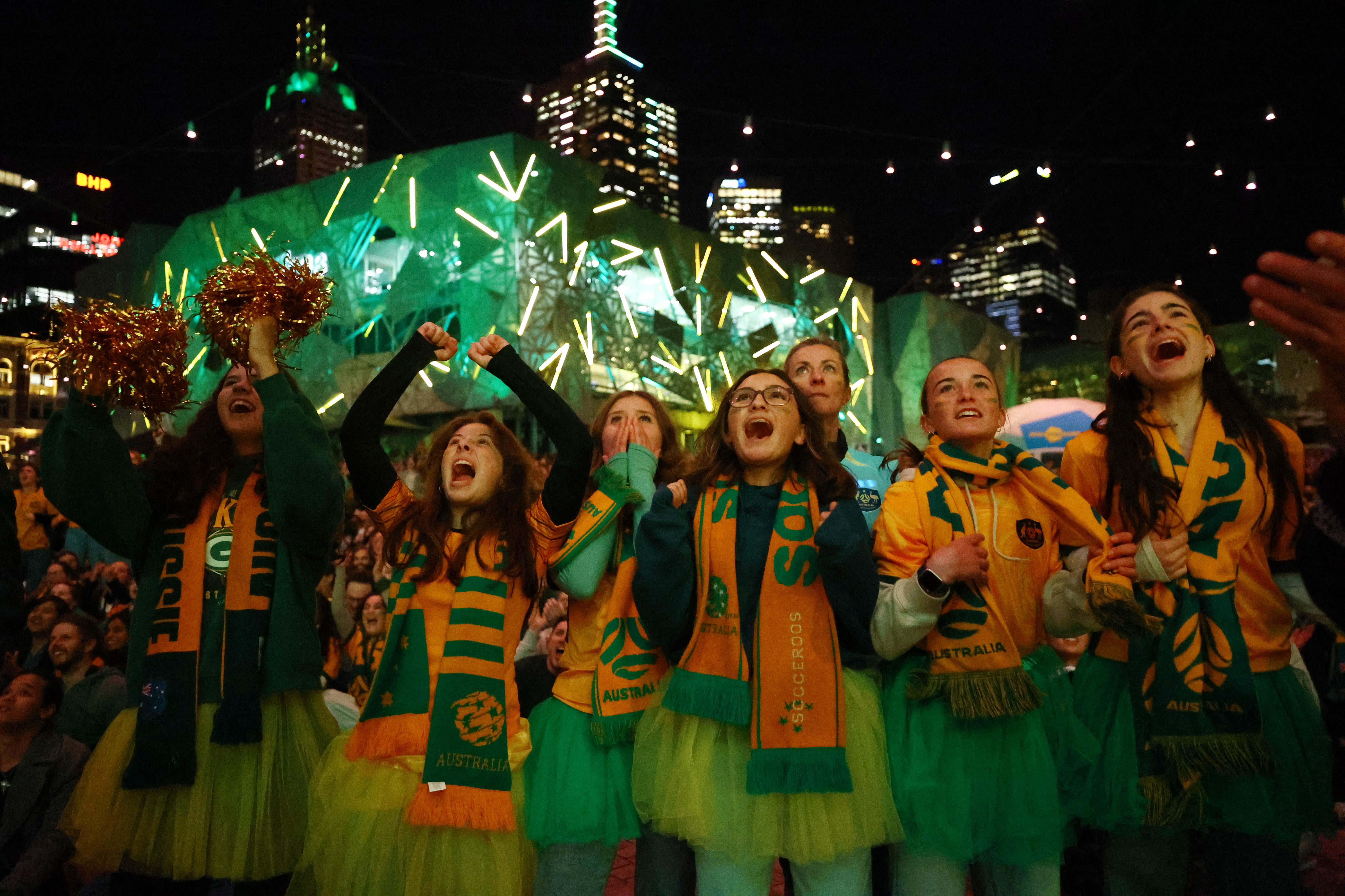 Soccer Football - FIFA Women's World Cup Australia and New Zealand 2023 - Fan Festival - Melbourne, Australia - August 7, 2023 Australia fans react as they watch the Australia v Denmark match at a fan zone in Melbourne REUTERS/Hannah Mckay