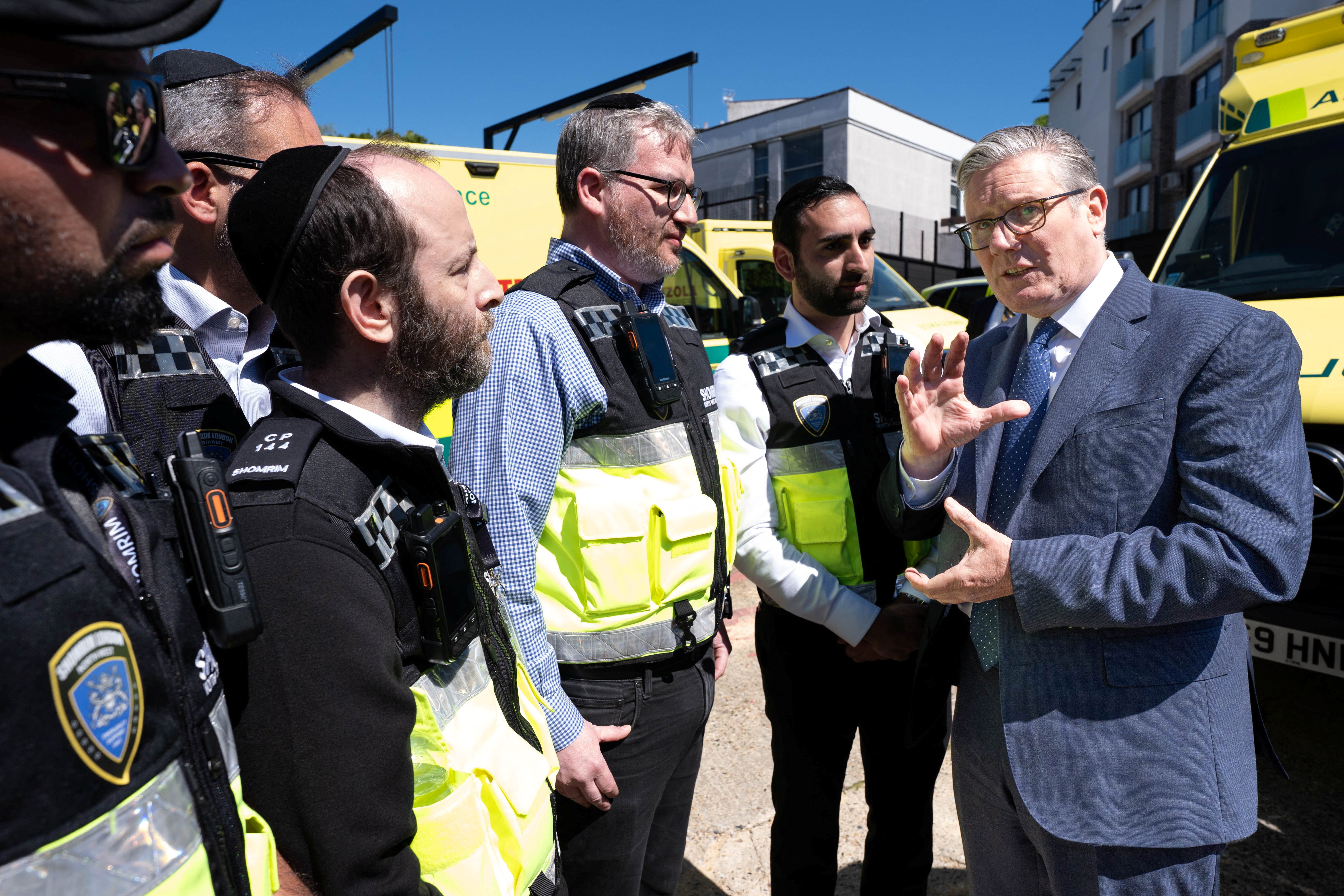 British Prime Minister Keir Starmer meets first responders from Shomrim North West London during a visit to Golders Green, north west London, following a terror attack on Wednesday morning in which two men were stabbed, in London, Britain, April 30, 2026. Stefan Rousseau/Pool via REUTERS