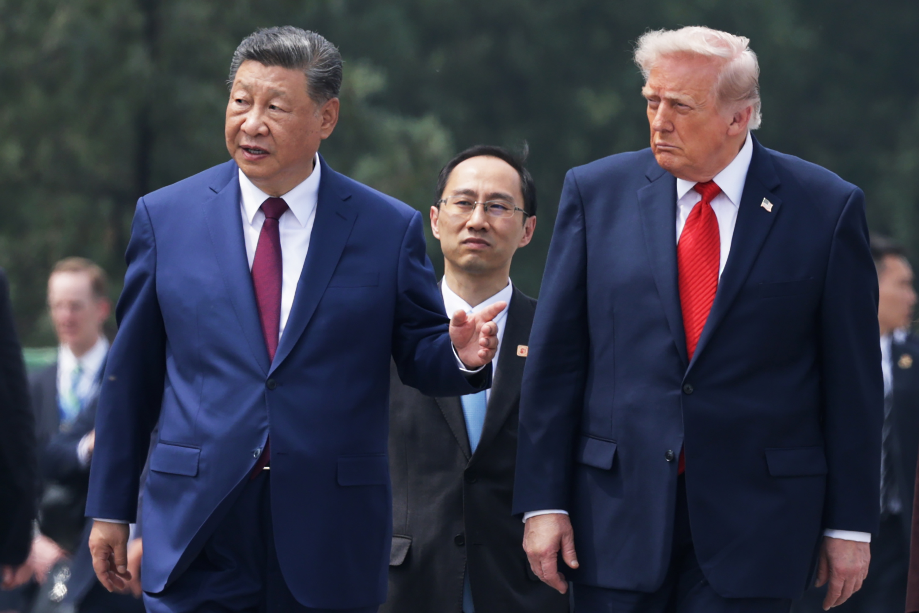 BEIJING, CHINA - MAY 14: U.S. President Donald Trump and Chinese President Xi Jinping arrive for a visit at the Temple of Heaven on May 14, 2026 in Beijing, China. President Trump is meeting with President Xi Jinping in Beijing to address the Iran conflict, trade imbalances, and the Taiwan situation while establishing new bilateral boards for economic and AI oversight. (Photo by Alex Wong/Getty Images)