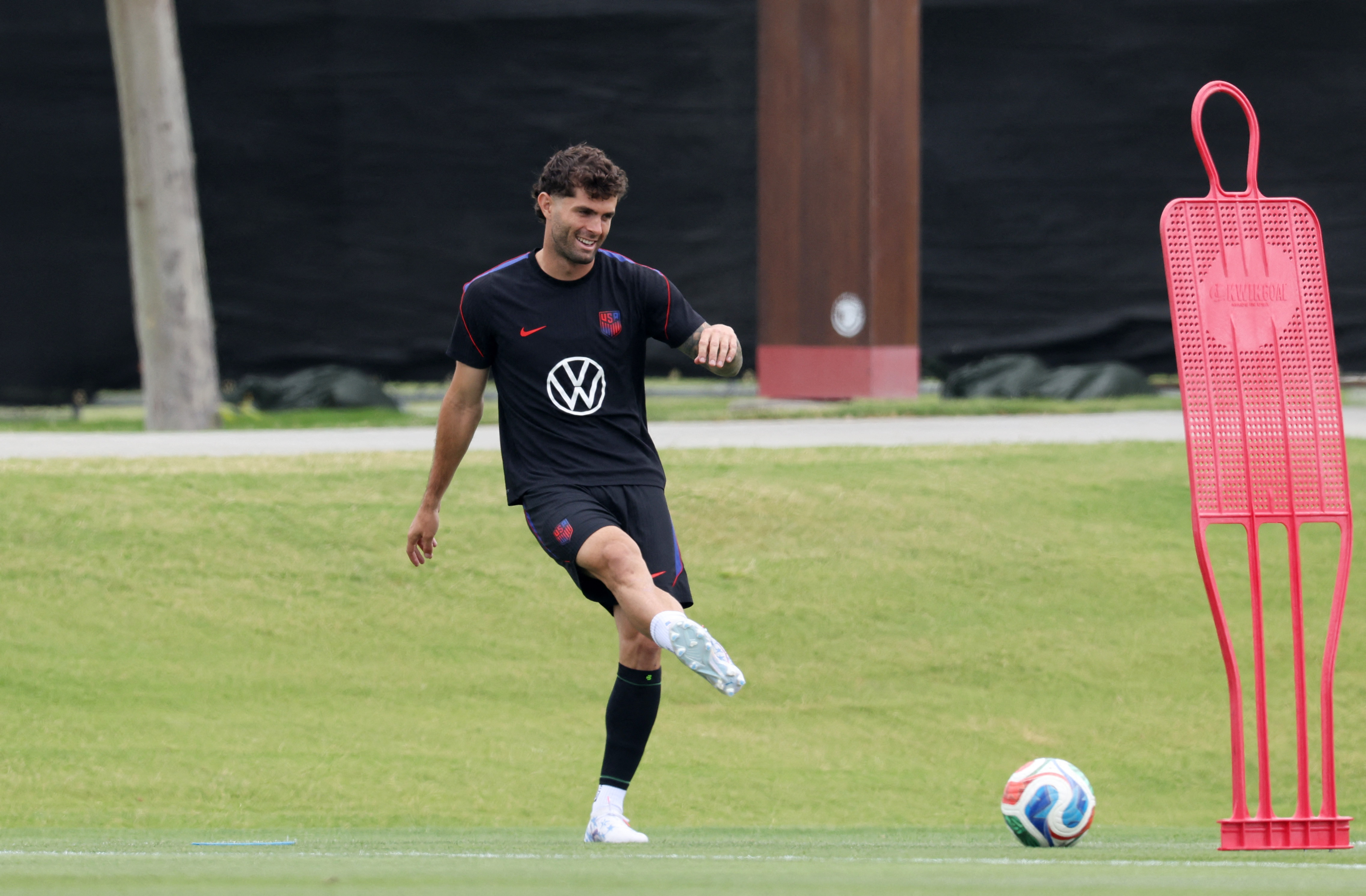 Christian Pulisic has had his left calf wrapped in a sleeve during training sessions at the University of Washington