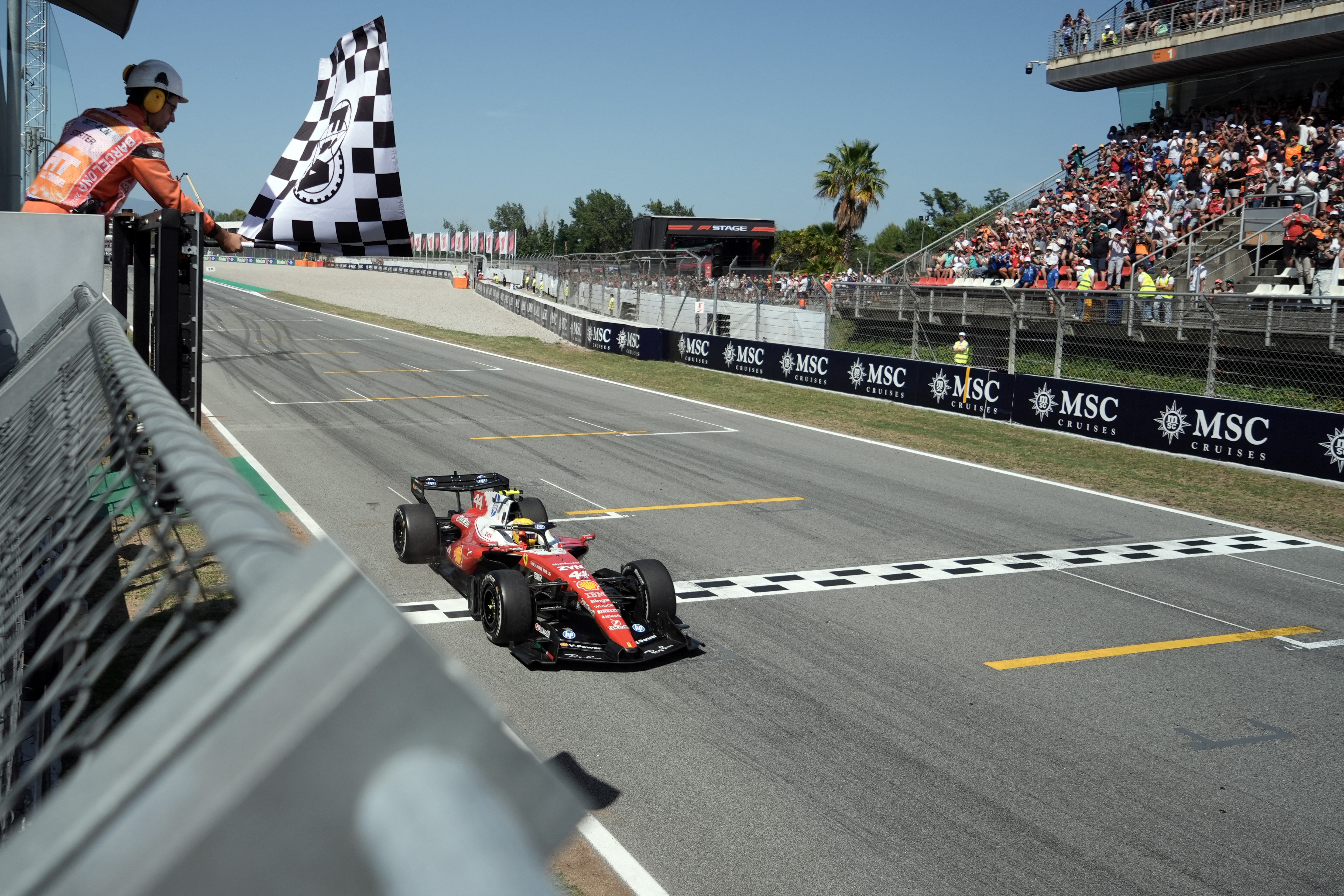 Hamilton crosses the finish line in Barcelona for his first F1 victory since July 2024