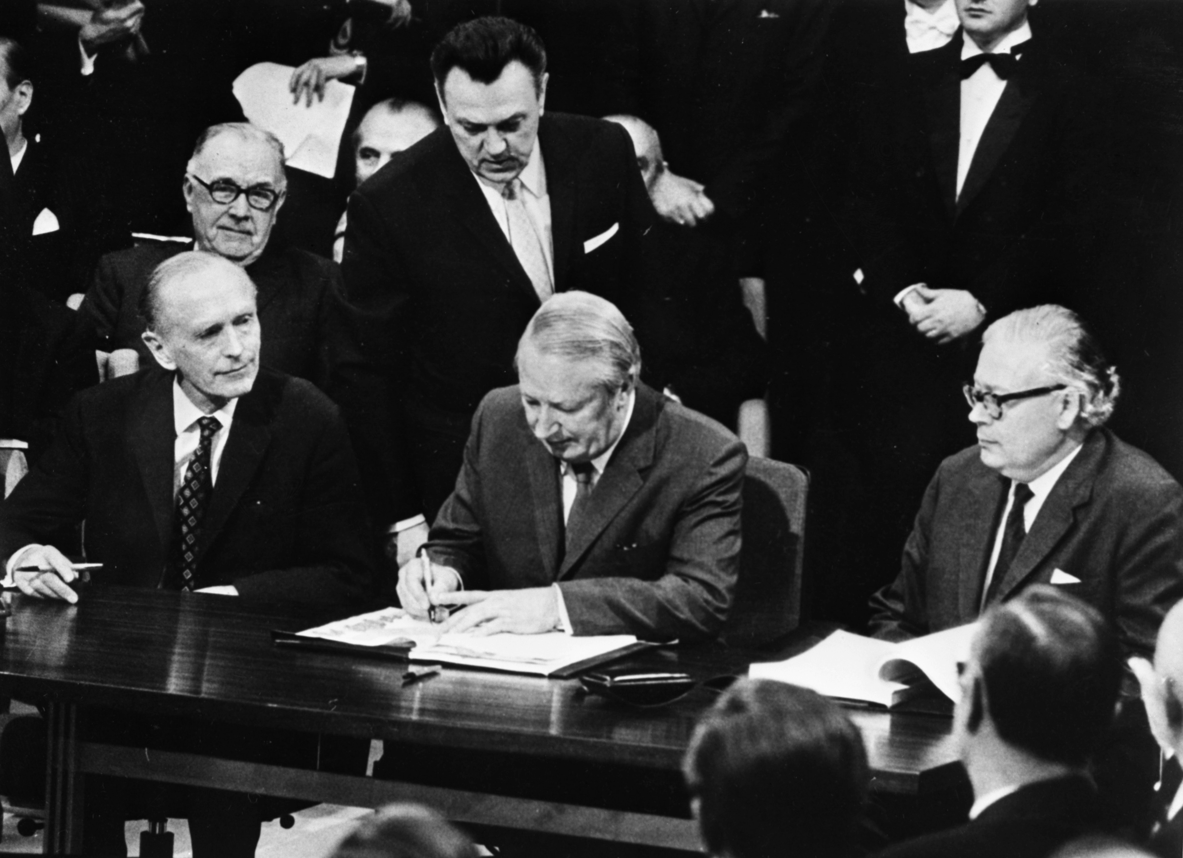 In this Jan. 22, 1972, file photo, British Prime Minister Edward Heath, middle, signs the treaty for Britain to join the European Economic Community at the Palais d'Egmont in Brussels, Belgium. Britain's membership was a drawn-out affair after French President Charles de Gaulle twice vetoed the country's application. [AP]