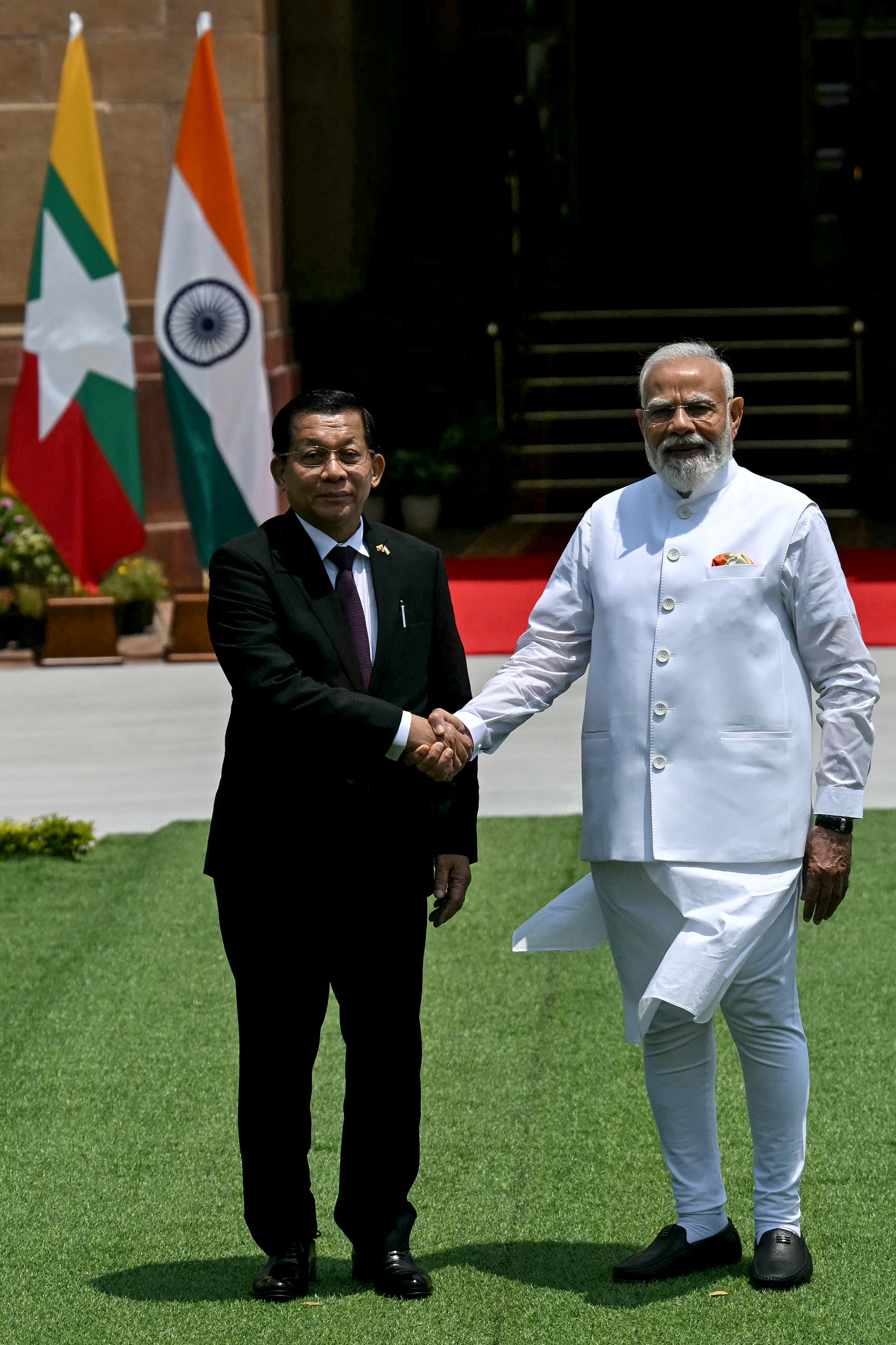 India's Prime Minister Narendra Modi (R) shakes hands with Myanmar's President Min Aung Hlaing before their meeting at the Hyderabad House in New Delhi on June 1, 2026.