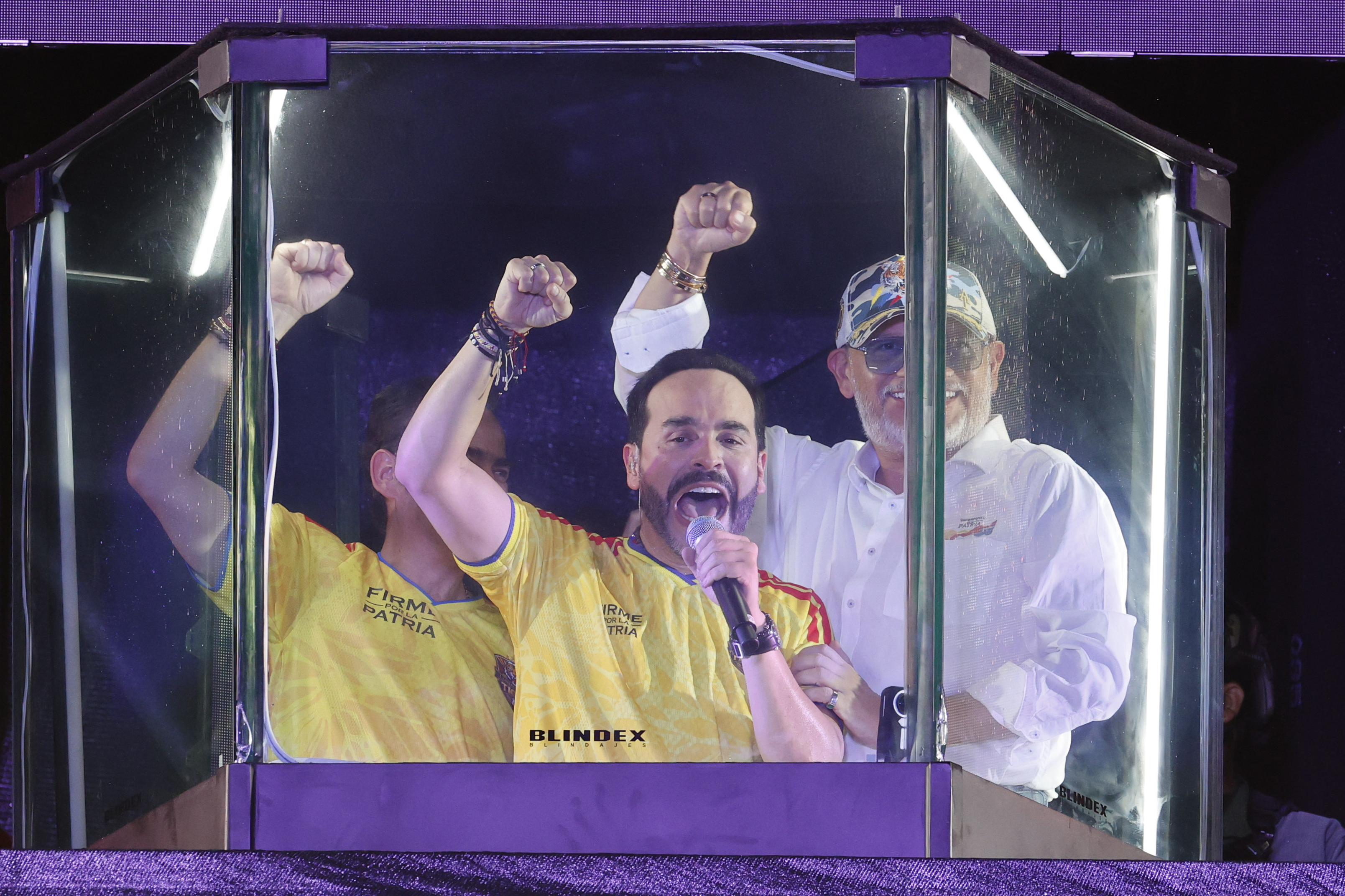 Far-right Colombian presidential candidate Abelardo de la Espriella (C) greets supporters.