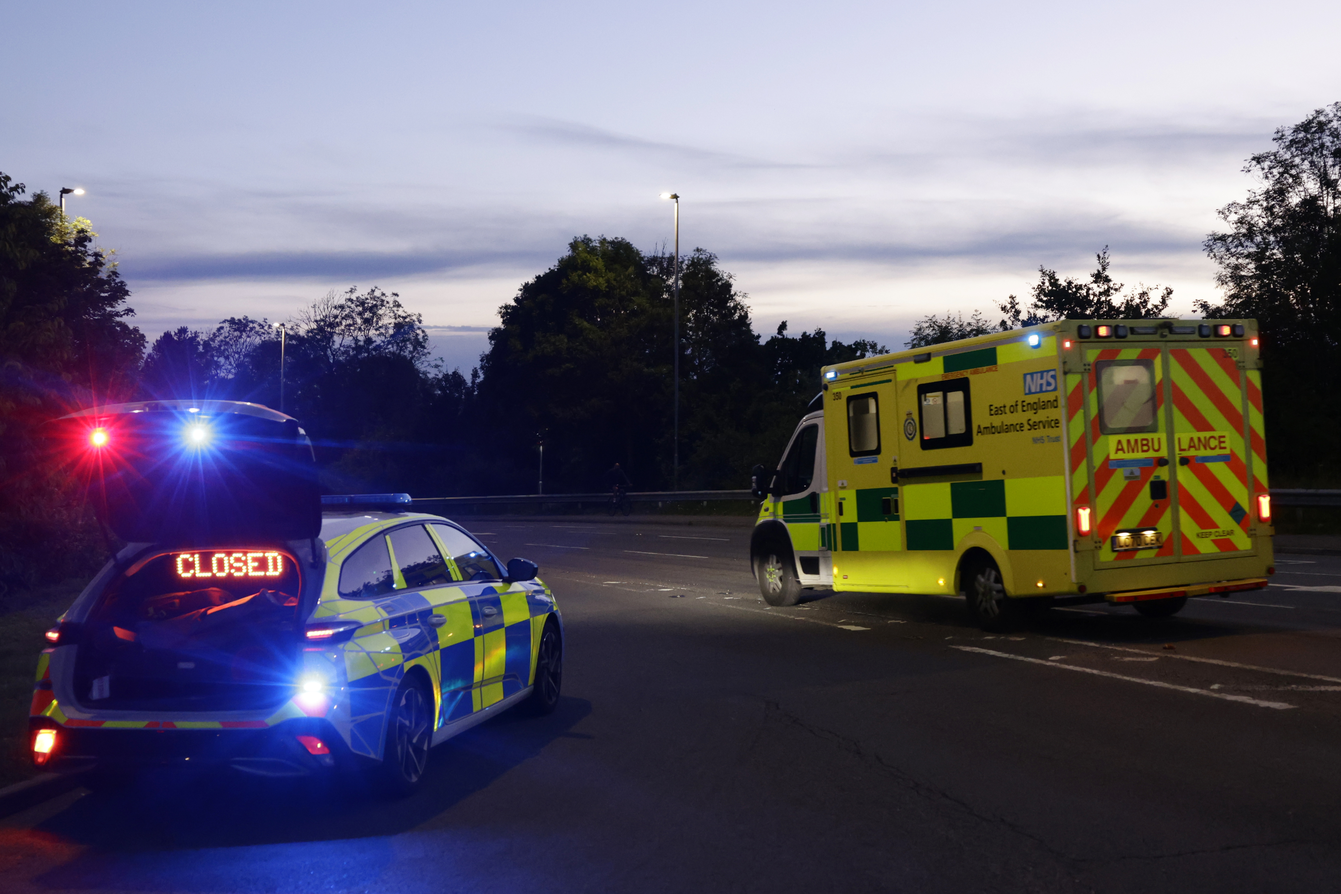 BEDFORD, ENGLAND - JUNE 19: Emergency vehicles are seen on Ampthill Road near the scene of a train crash south of Bedford on June 19, 2026 in Bedford, England. One person has died in a serious collision between two high-speed East Midlands Railway passenger trains occurred this evening between Luton and Bedford, completely blocking all rail lines and halting services in and out of London. More than 30 emergency vehicles, a Hazardous Area Response Team, and an air ambulance are on the scene treating multiple serious injuries, with Bedford Hospital placed on high alert for casualties. (Photo by Brook Mitchell/Getty Images)