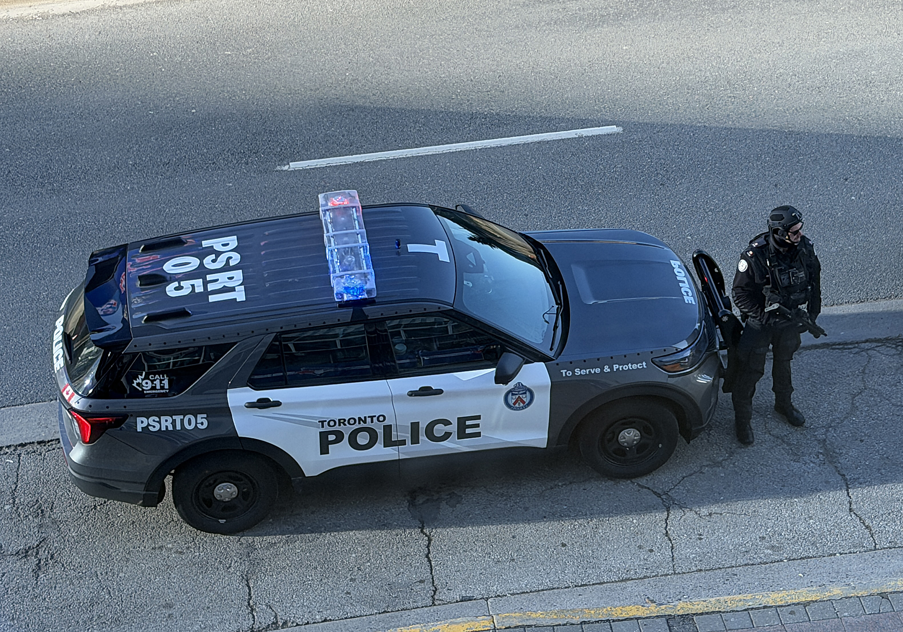Mar 27, 2026; Toronto, Ontario, CAN; The Toronto Police Anti Terrorism squad stands guard outside the Rogers centre before the Opening Day game between the Athletics and Toronto Blue Jays. Mandatory Credit: Nick Turchiaro-Imagn Images