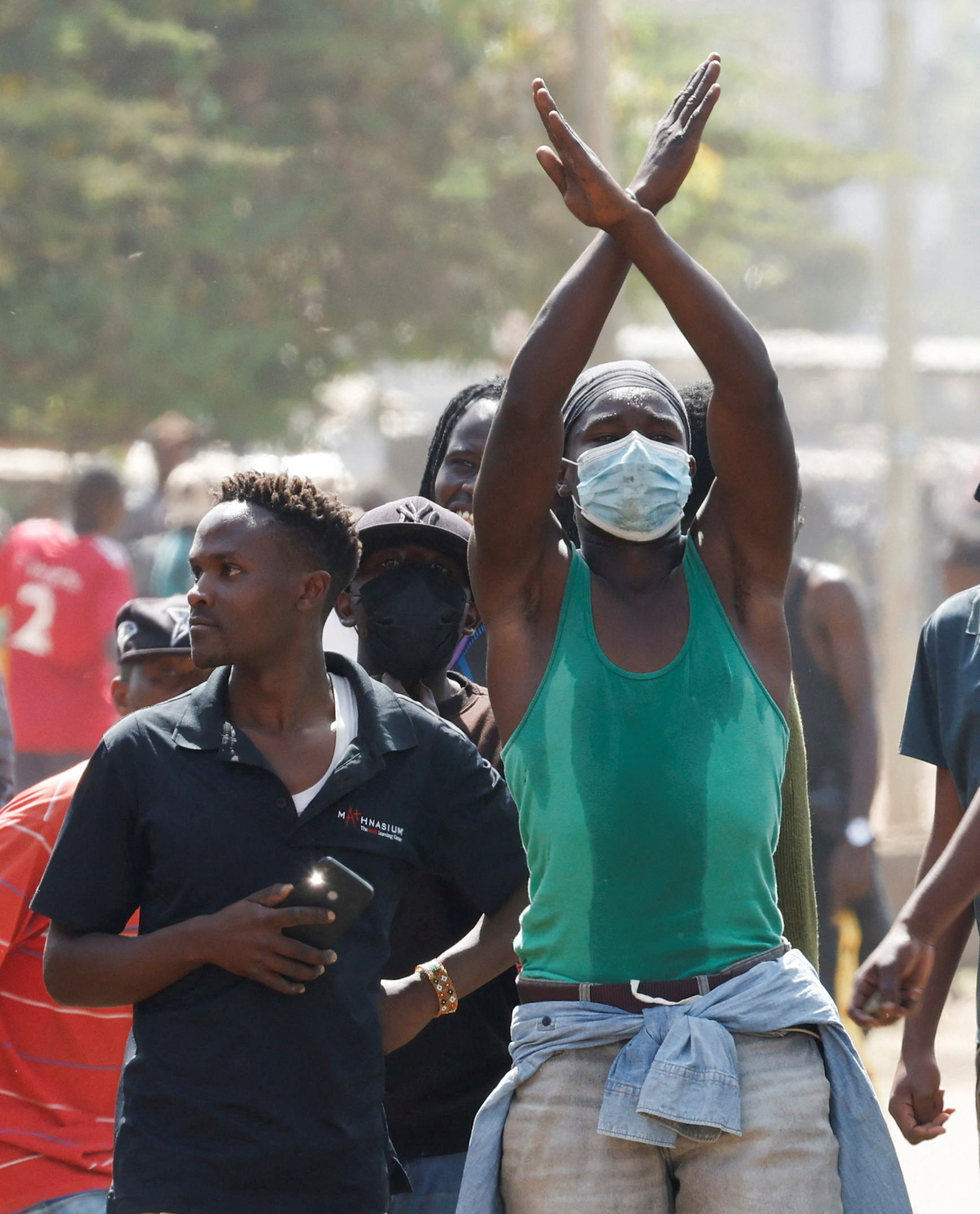 Demonstrators gather along a street in a protest against a U.S.-backed Ebola quarantine plan to establish a 50-bed facility at a Kenyan air force base intended to host Americans exposed to Ebola, in Nanyuki town, Laikipia County, Kenya, June 9, 2026. REUTERS/Monicah Mwangi