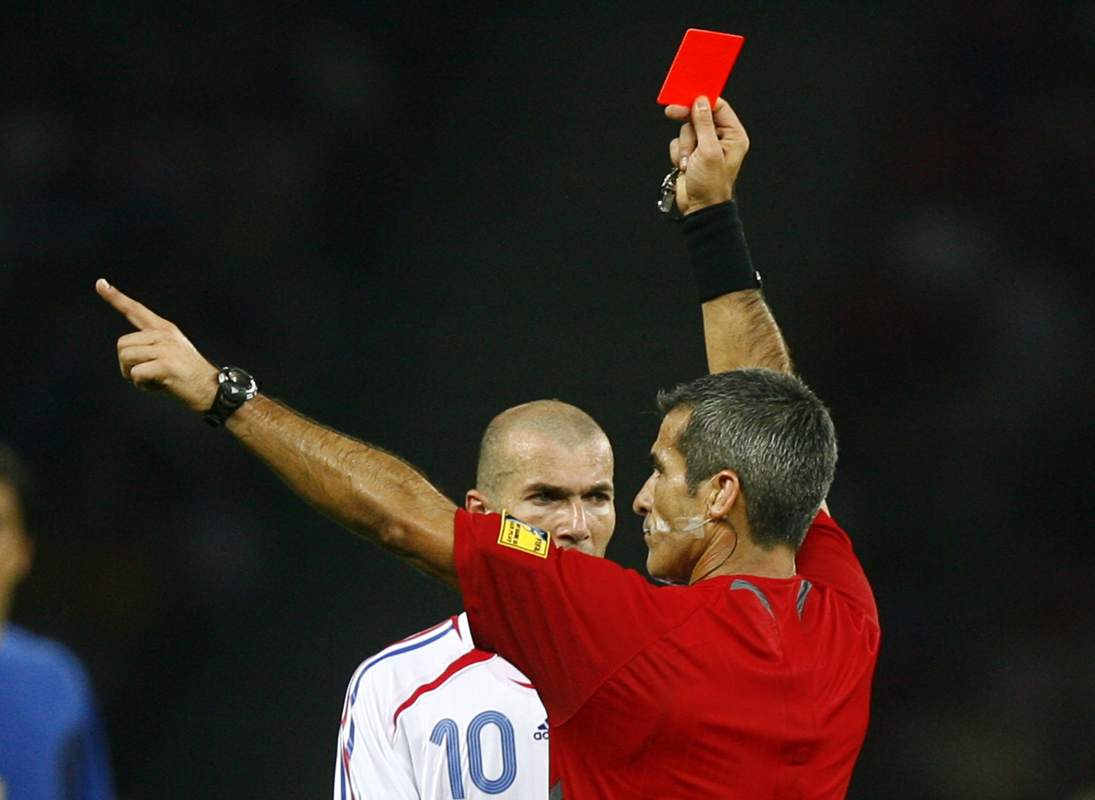 Referee Horacio Elizondo, right, of Argentina shows France's Zinedine Zidane a red card during their World Cup 2006 final 