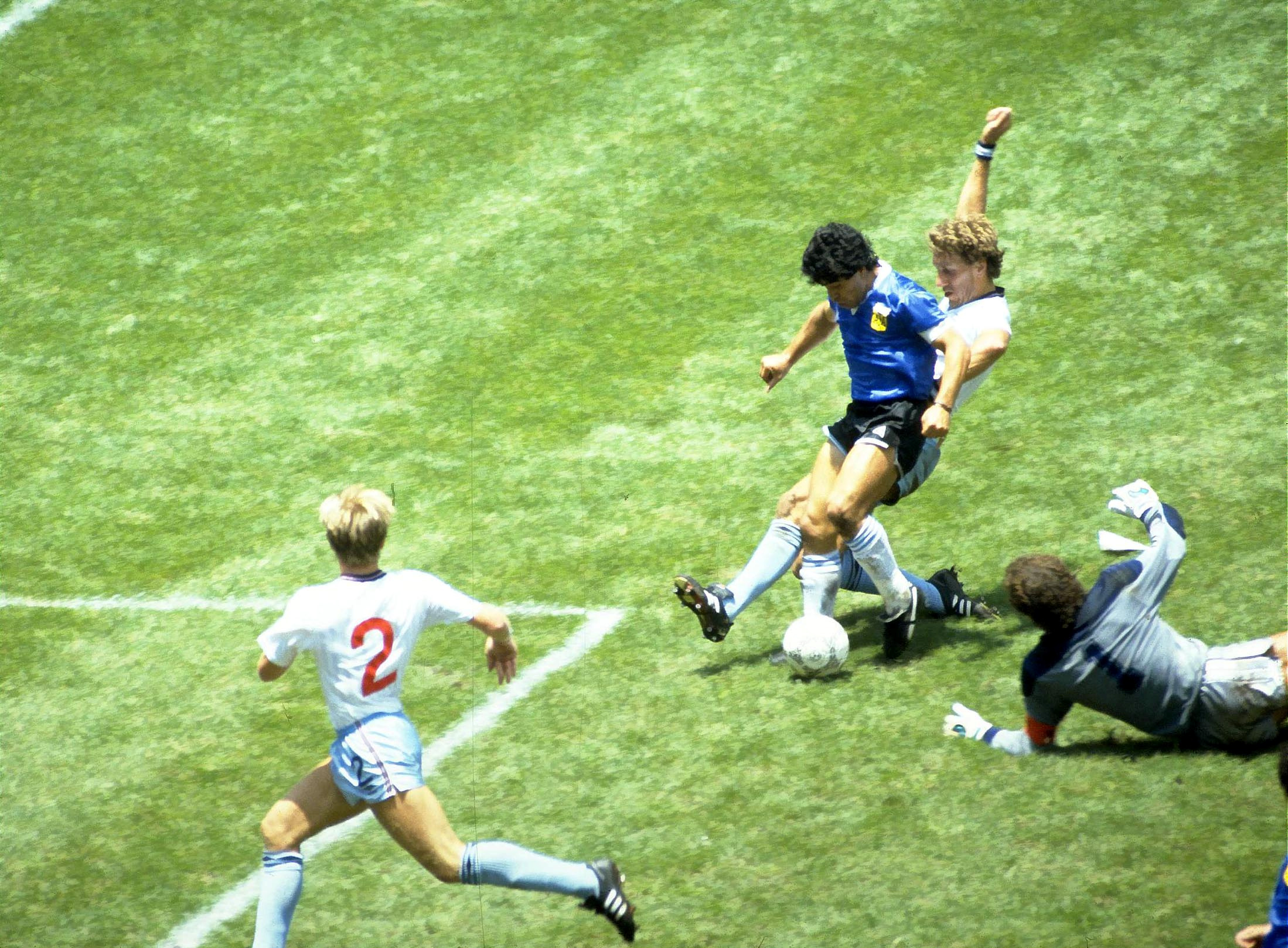 Diego Maradona scores his second against England in the 1986 World Cup in Mexico
