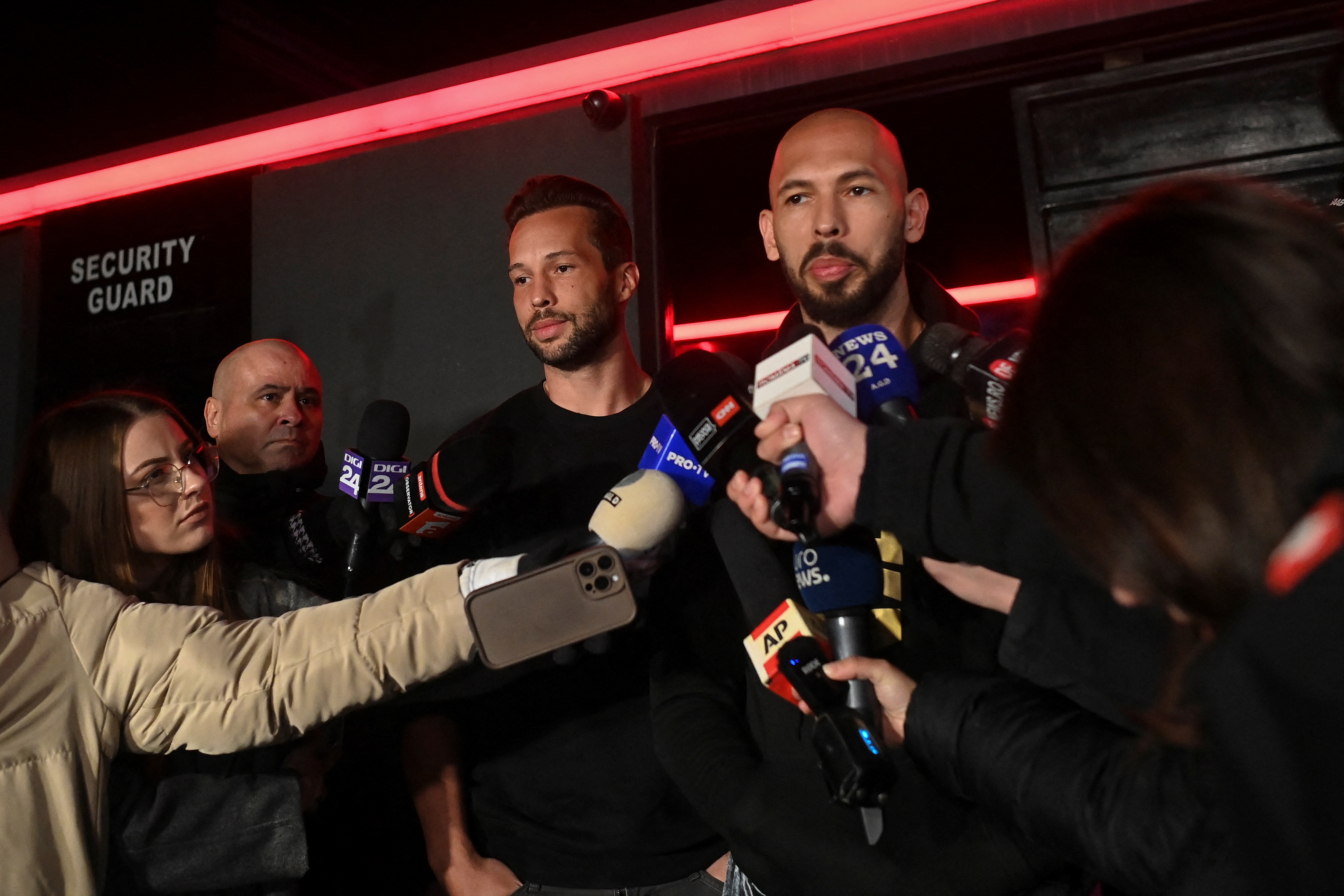 Andrew and Tristan Tate speaking to press