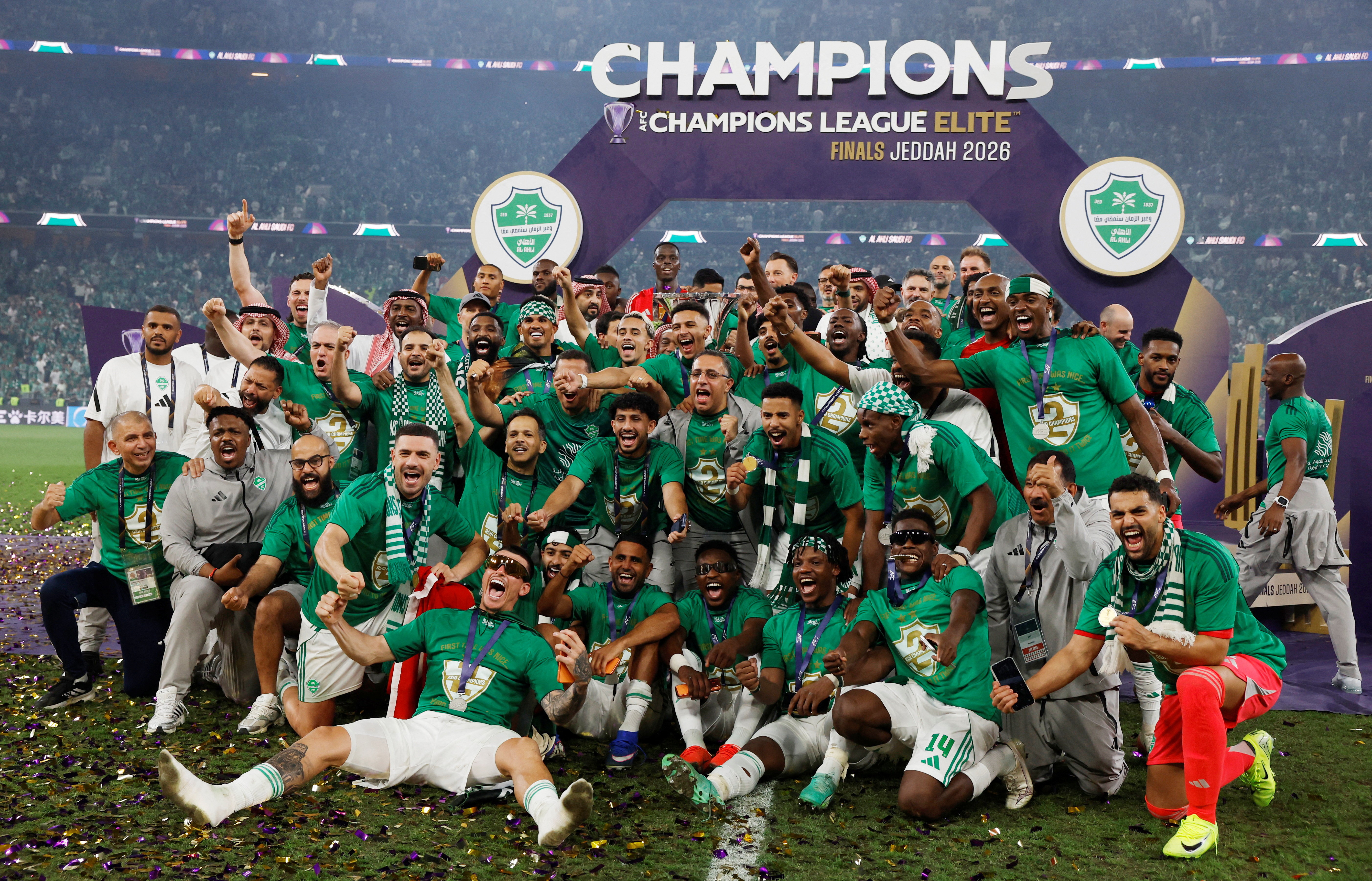 Al-Ahli players celebrate.