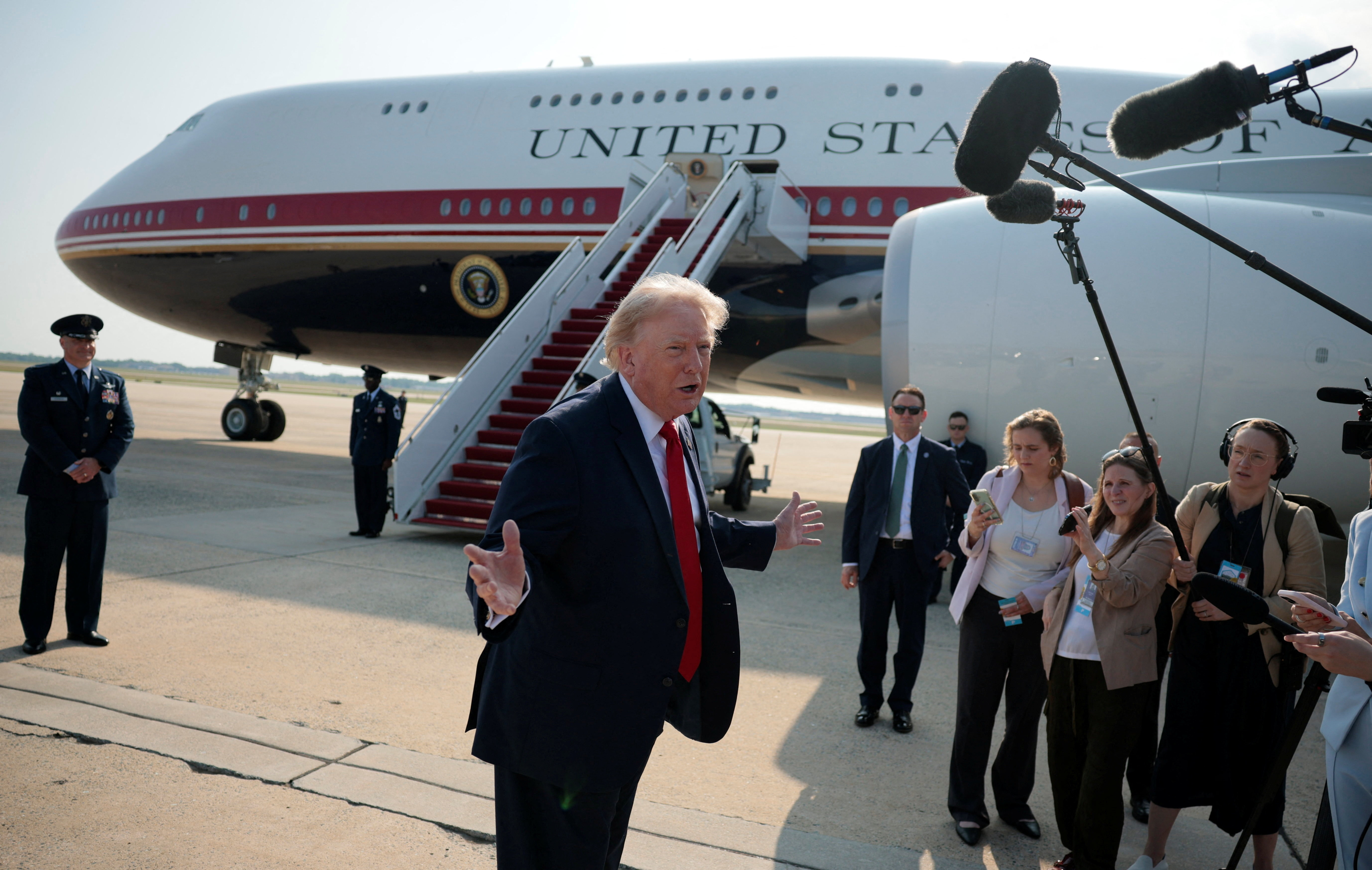 U.S. President Donald Trump gestures as he speaks with reporters before boarding the new Air Force One, a plane gifted by the Qatari government, at Joint Base Andrews, Maryland, U.S., July 1, 2026. REUTERS/Evan Vucci