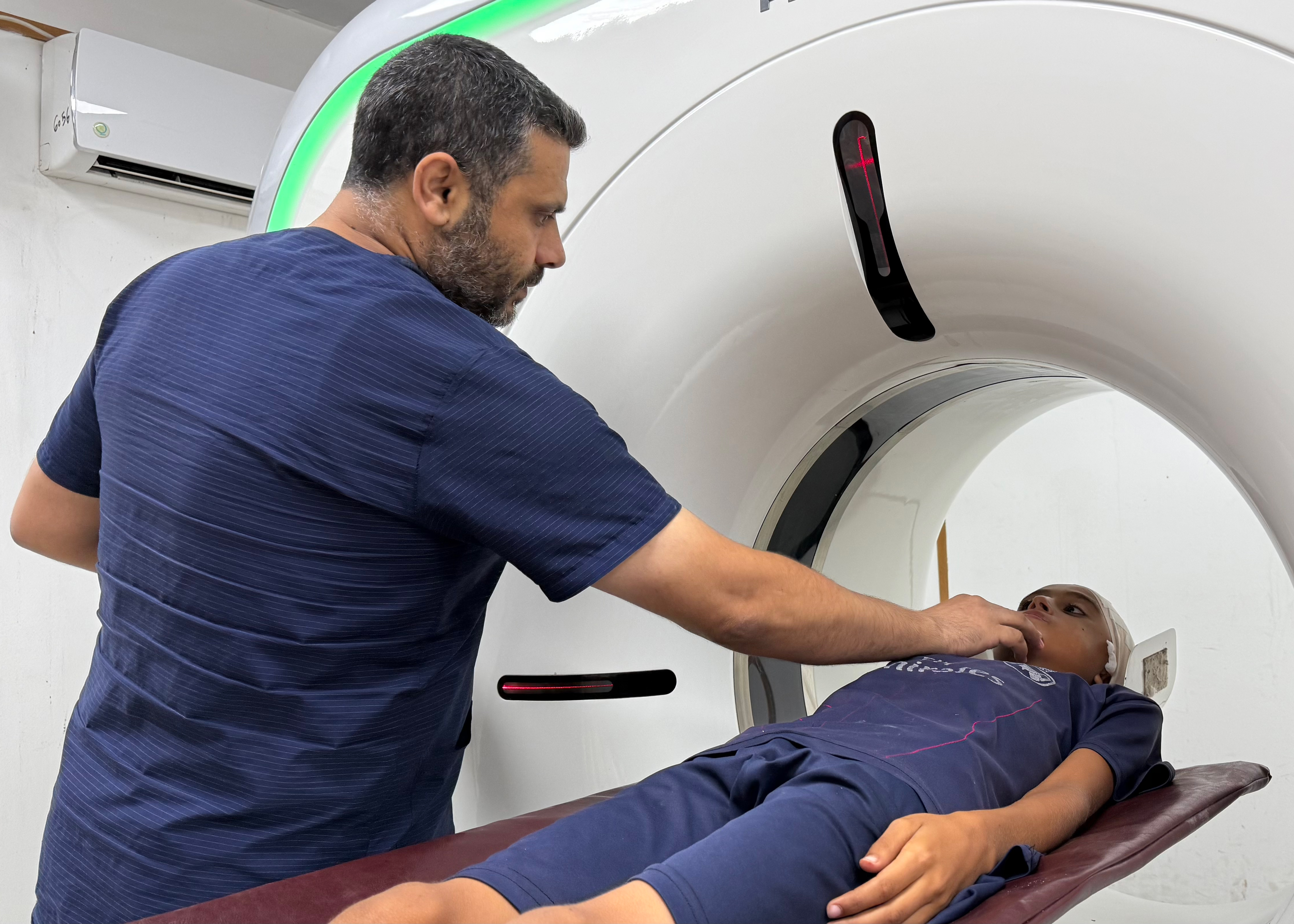 Gaza’s CT Scan Crisis [Eman Abu Zayed/Al Jazeera]